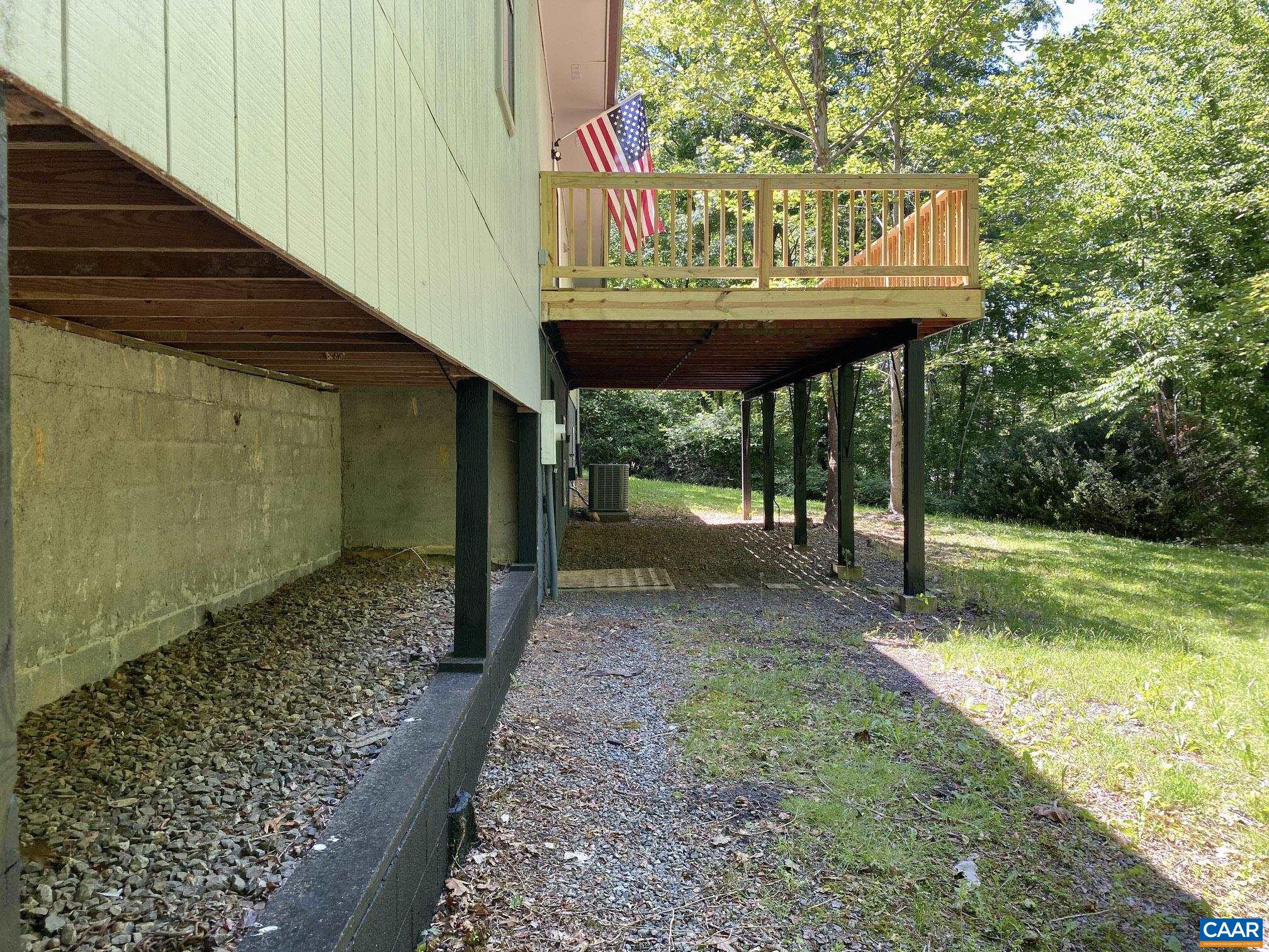 Covered storage space ideal for kayaks, lawn supplies, wood! Covered storage space ideal for kayaks, lawn supplies, wood!