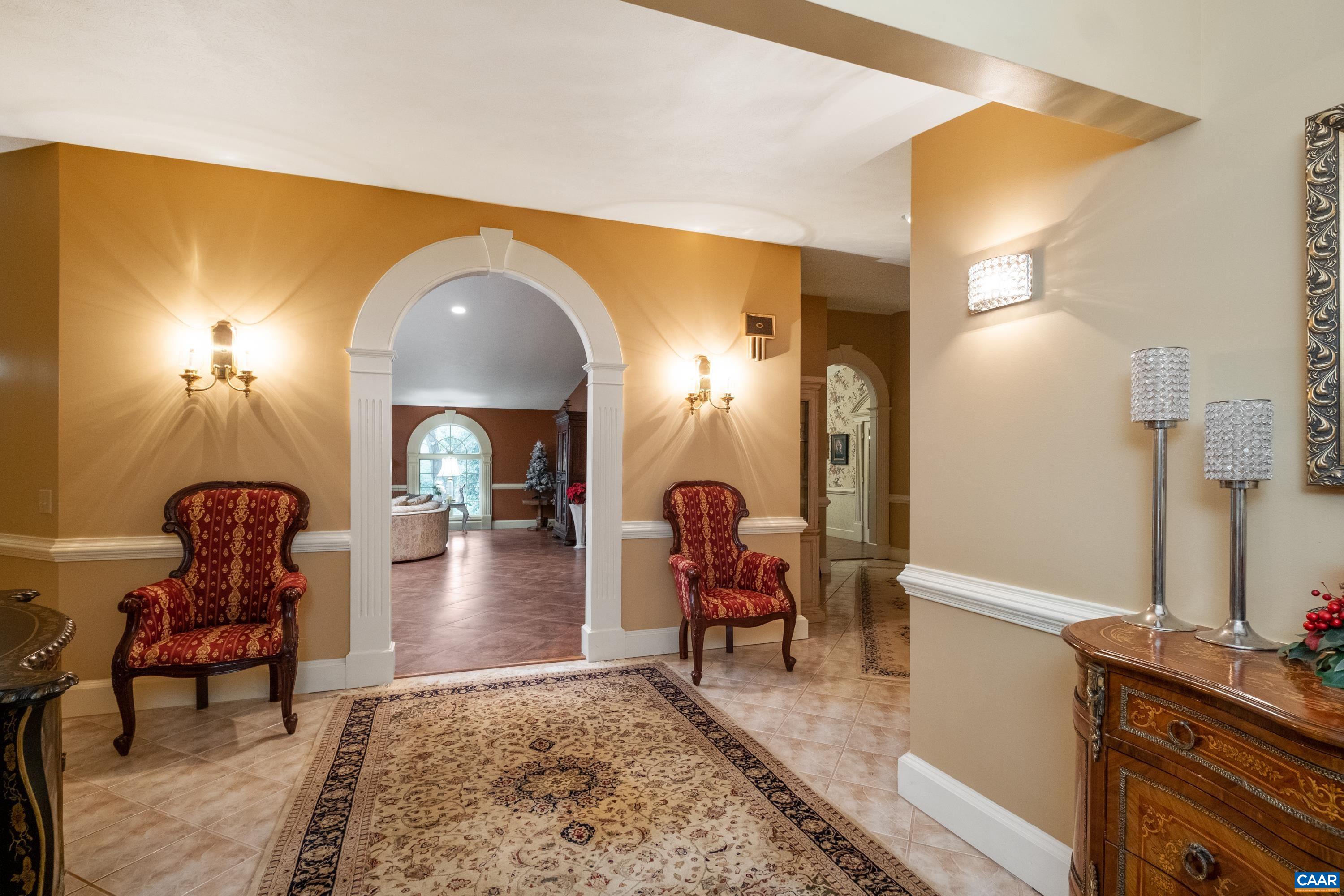 Just off the balcony, enter into the foyer of the second level residence.