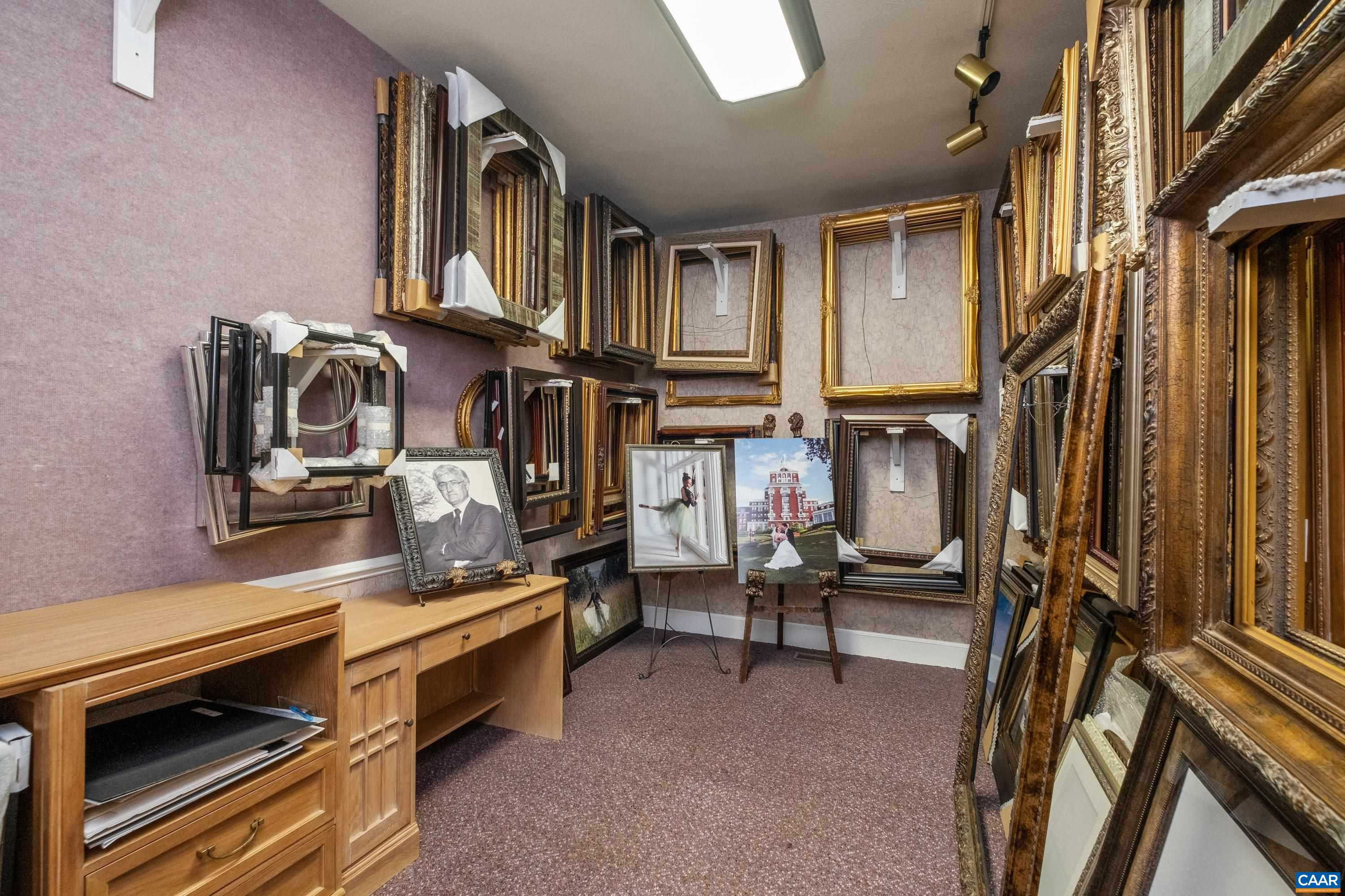 This room is located just off of the great room, in the same hallway as the sitting room and the study.  It is currently being used as a framery.