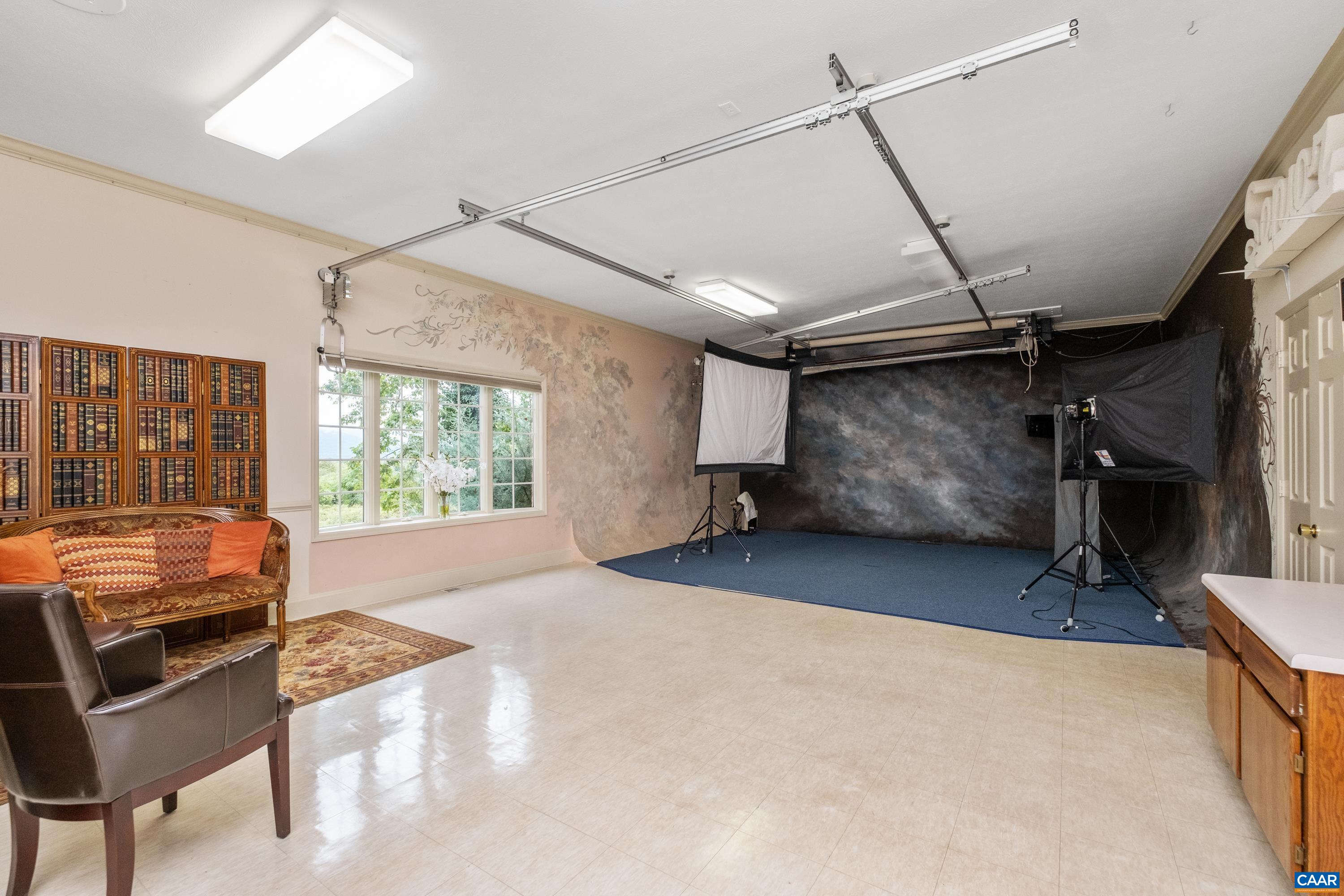 Another studio/multipurpose room.  In view is a bay window with beautiful mountain views.