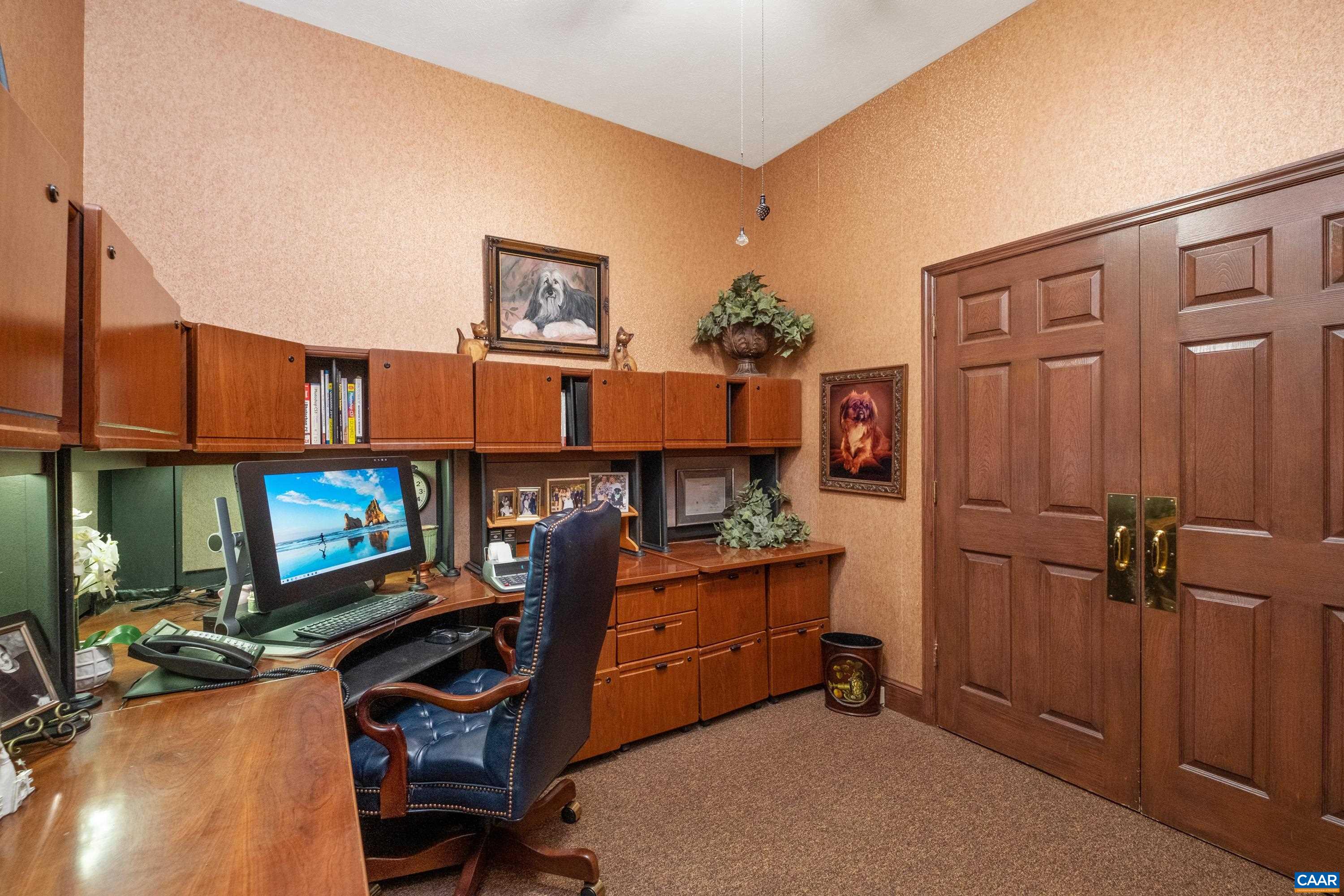This space is currently being used as an office, and includes closet space.