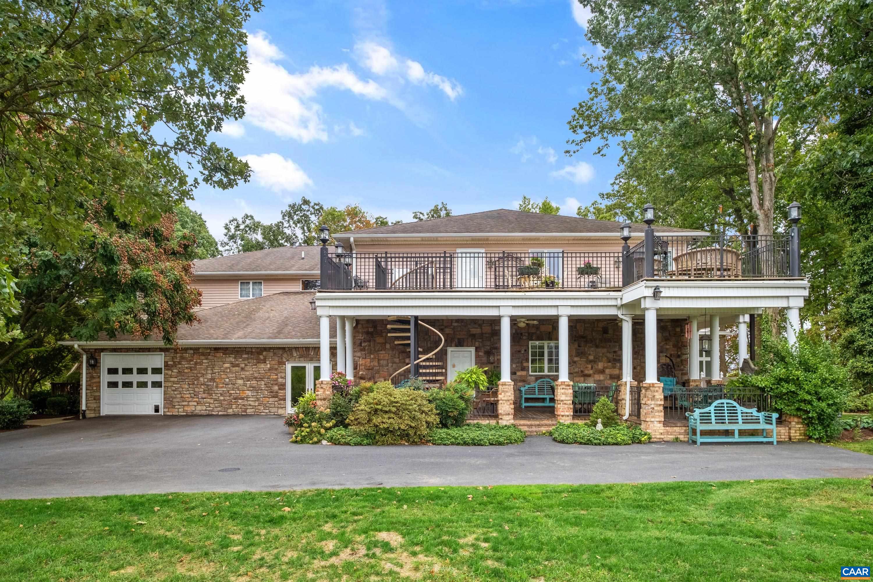 Lovely view of the exquisite stone masonry and brick patio.