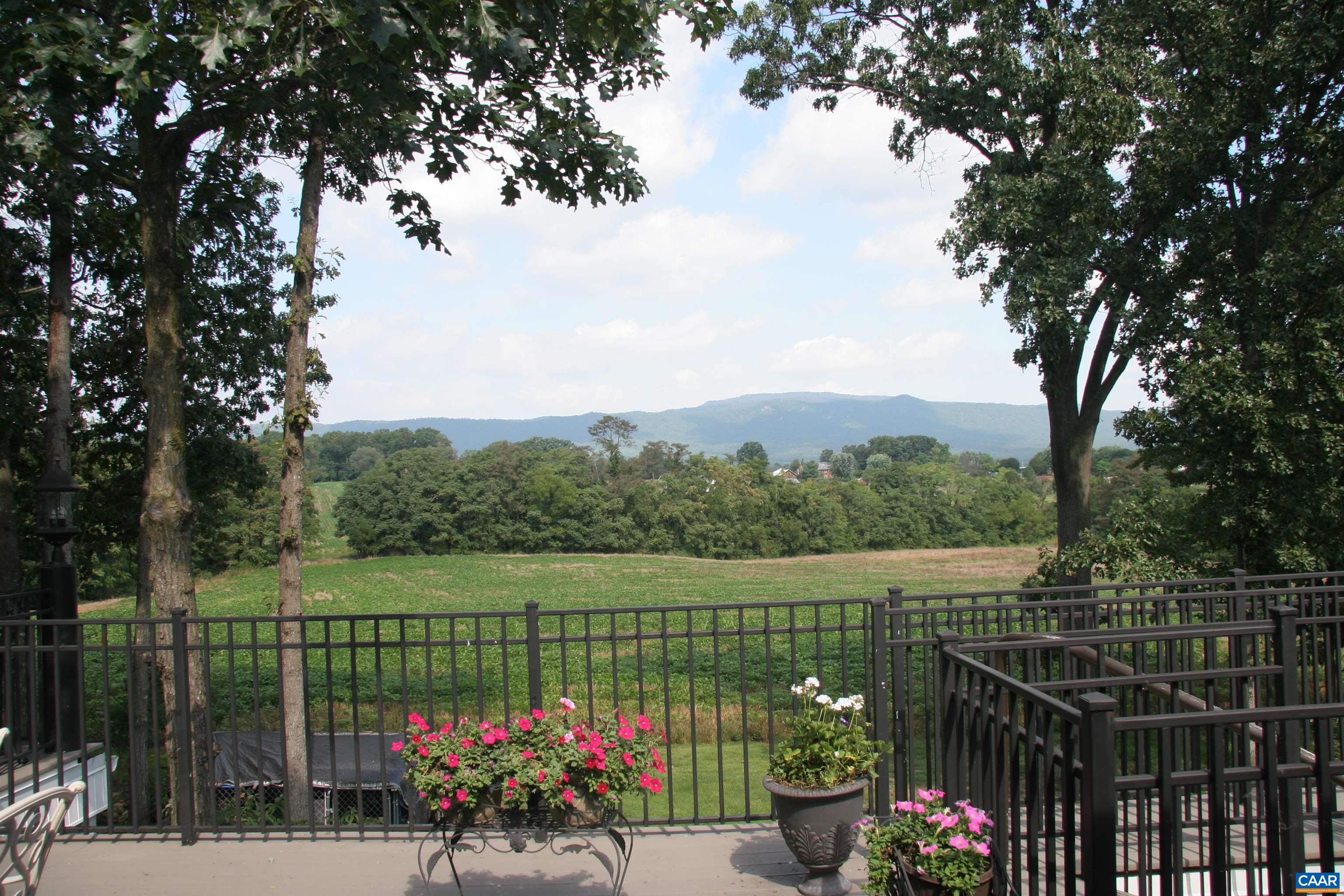In view are mountain views from the second level deck.