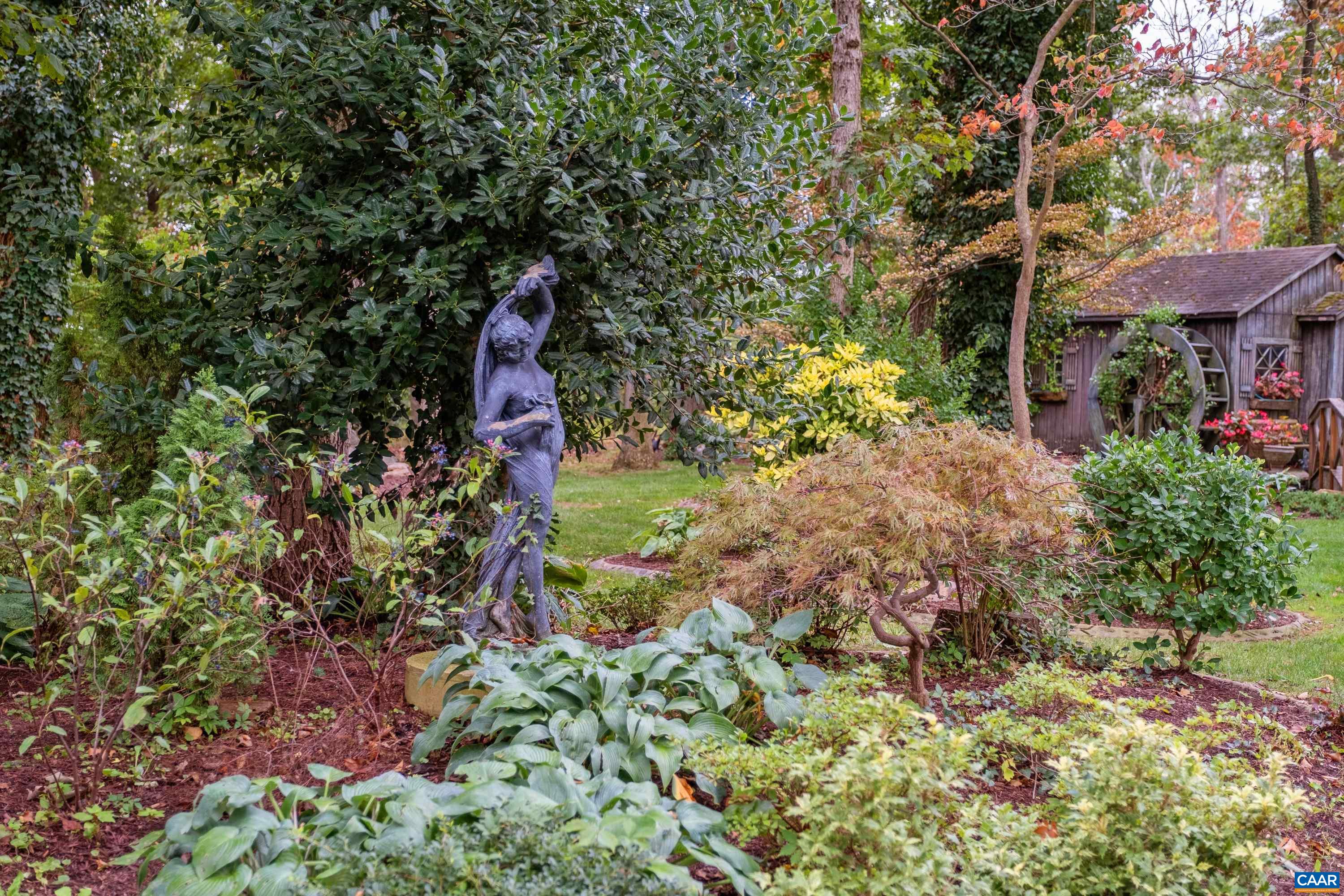 Lush landscaping adorns the property.
