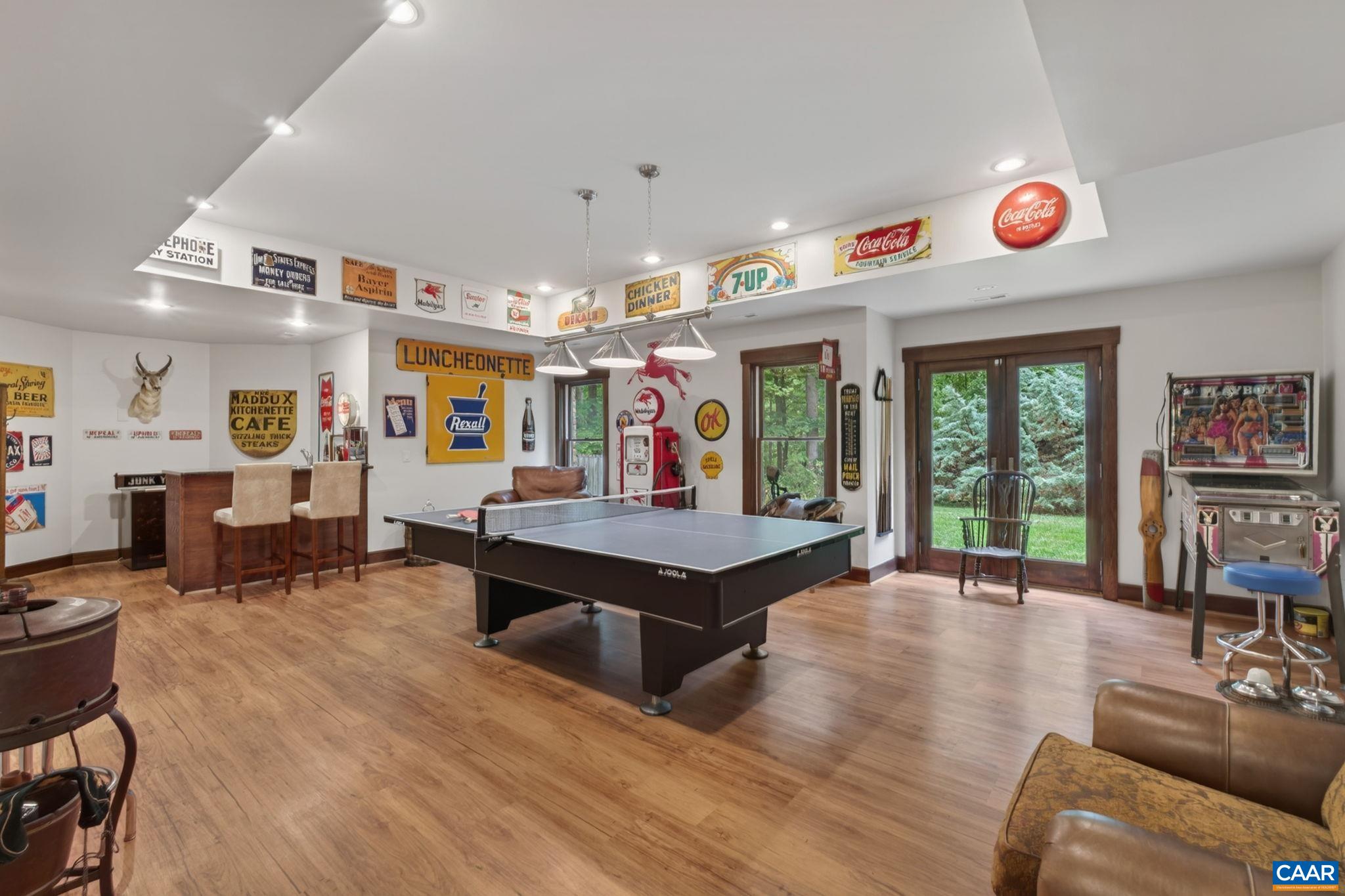 Terrace level family/rec room with wetbar. Terrace level family/rec room with wetbar.