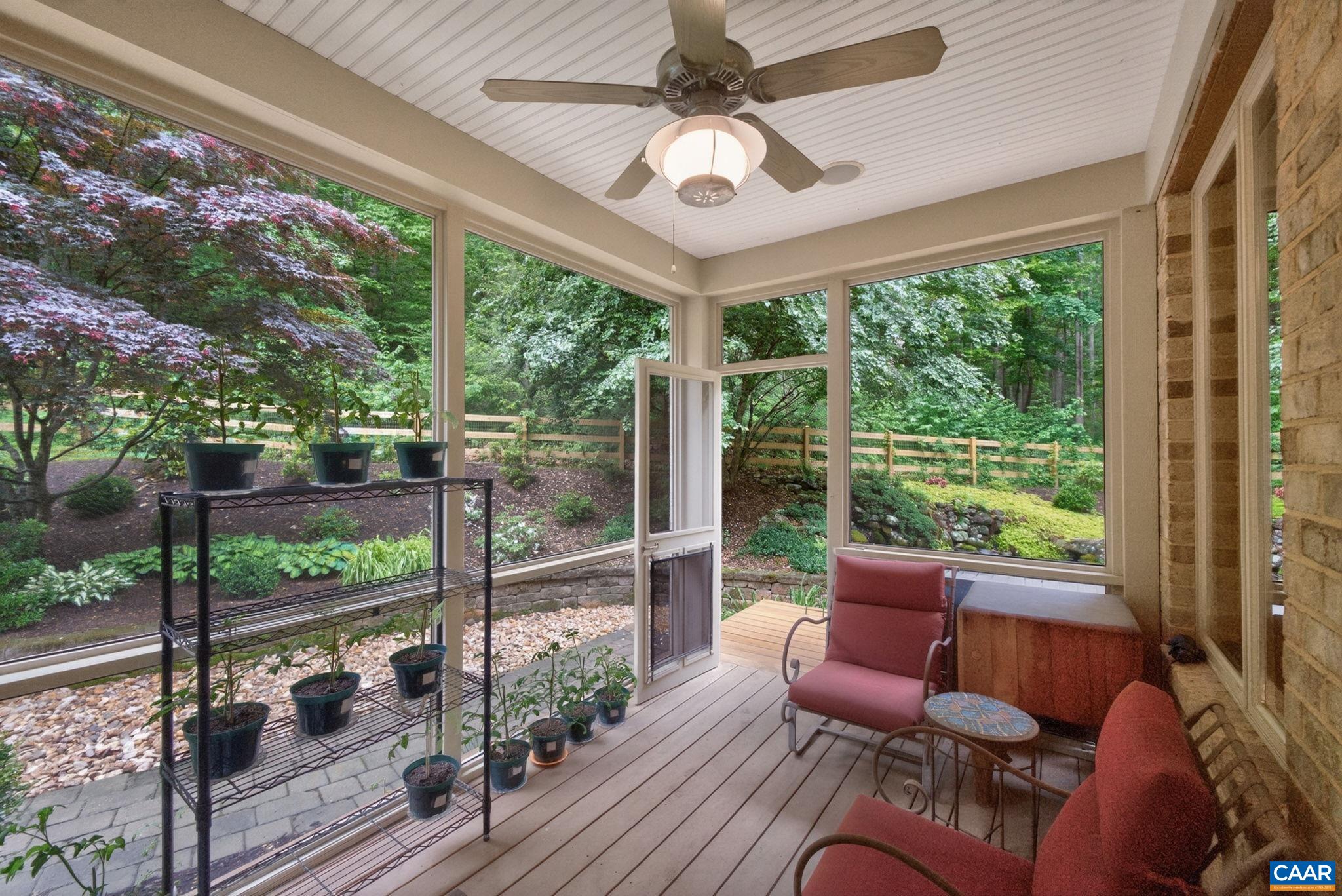 Screen porch off kitchen. Screen porch off kitchen.