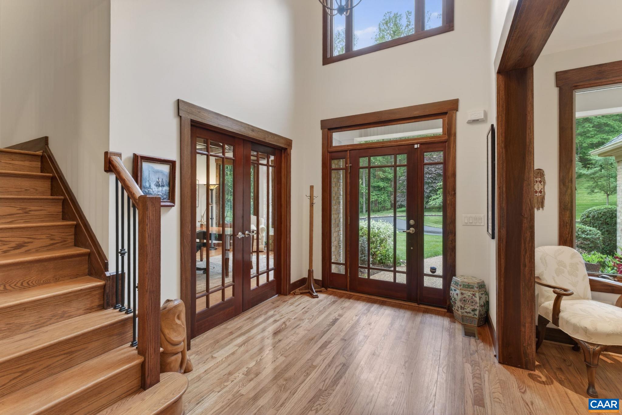 Front foyer upon entering the home with home office at left. Front foyer upon entering the home with home office at left.
