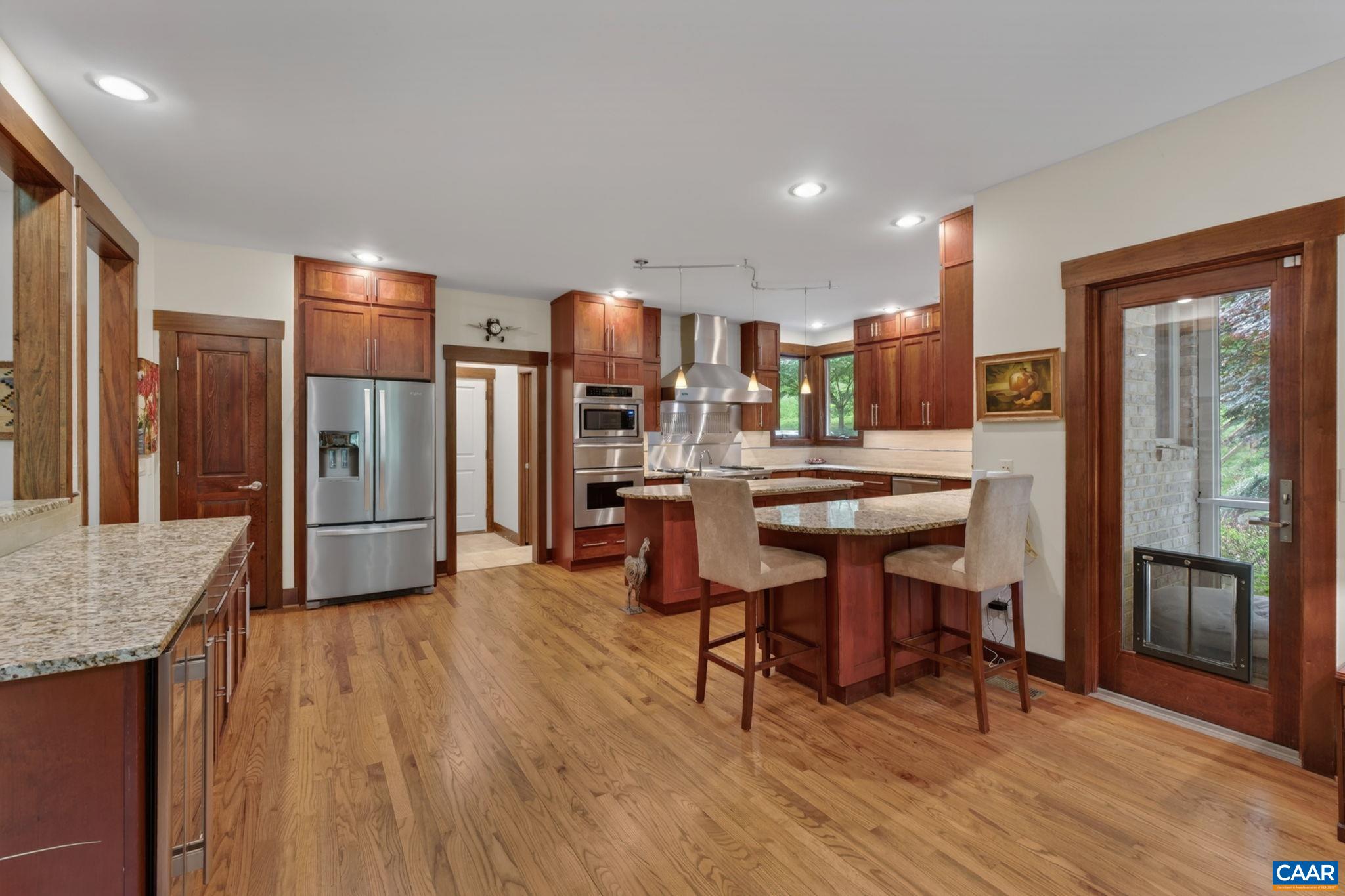 Superb gourmet kitchen with pantry, lots of cabinet space and granite countertop. Superb gourmet kitchen with pantry, lots of cabinet space and granite countertop.