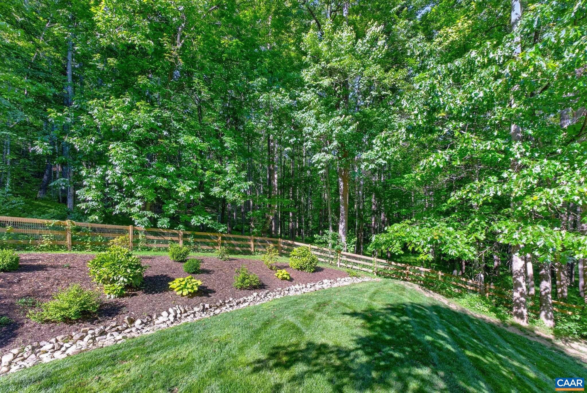 Landscaped backyard is fully fenced. There is also an invisible fence. Landscaped backyard is fully fenced. There is also an invisible fence.