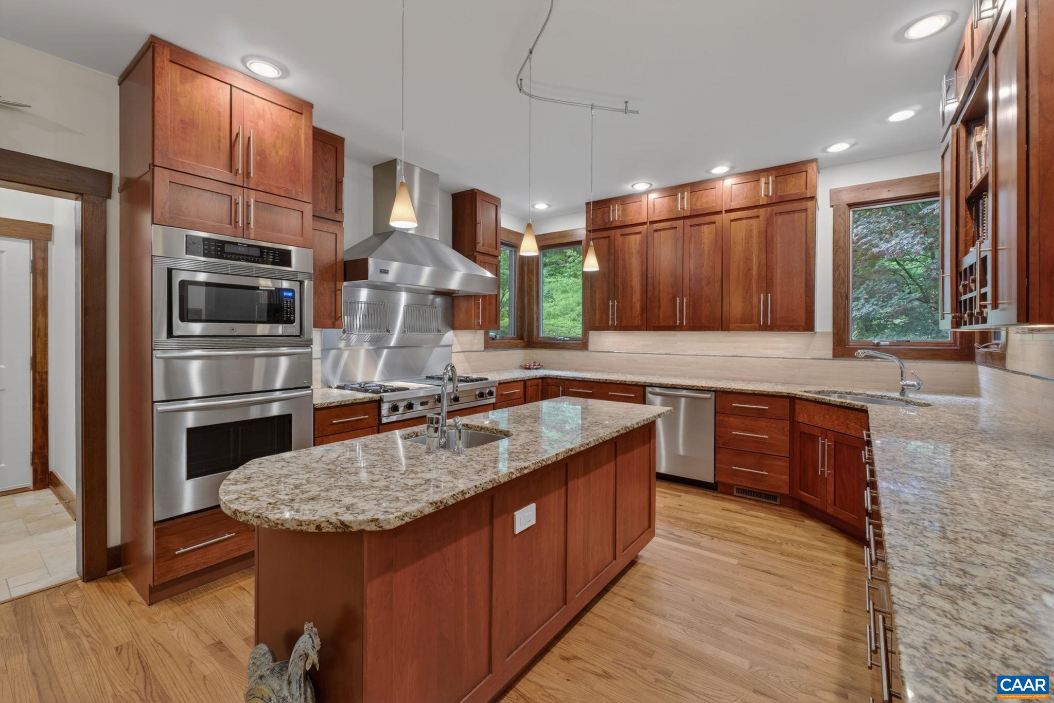 Stainless kitchen appliances include Viking gas cooktop and wall oven/microwave. Stainless kitchen appliances include Viking gas cooktop and wall oven/microwave.