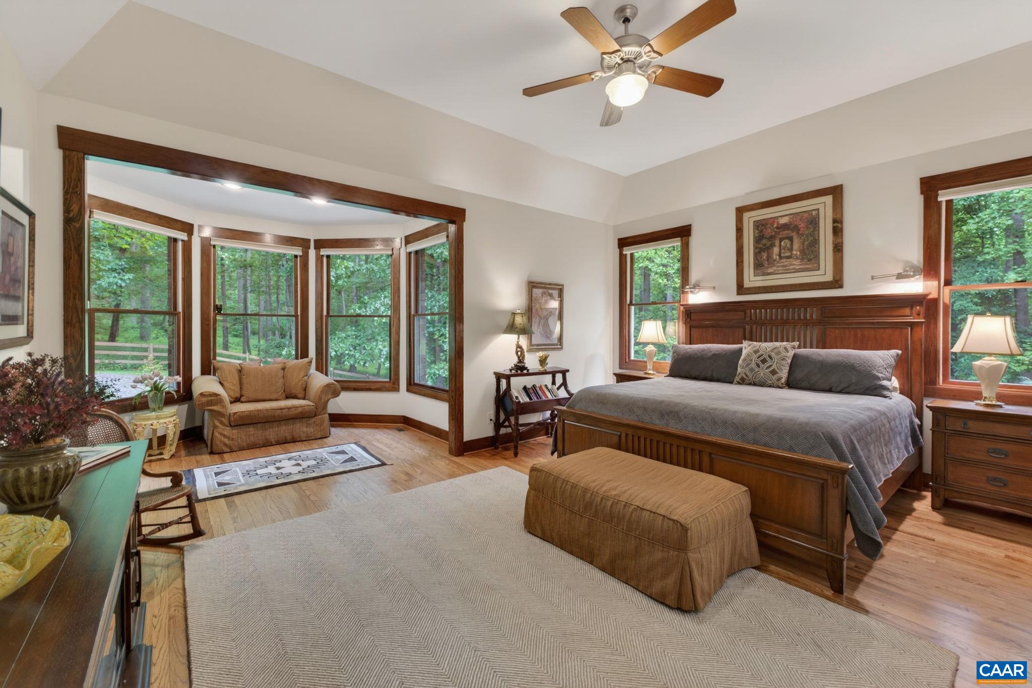 Large primary suite with sitting area. Large primary suite with sitting area.
