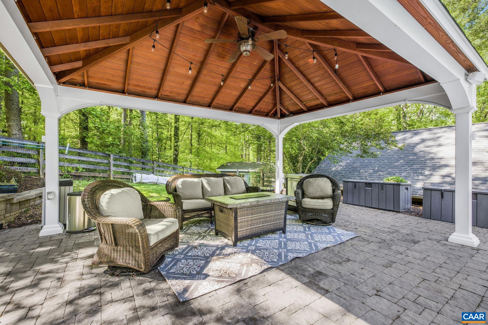 Covered pool gazebo offers plenty of shade.