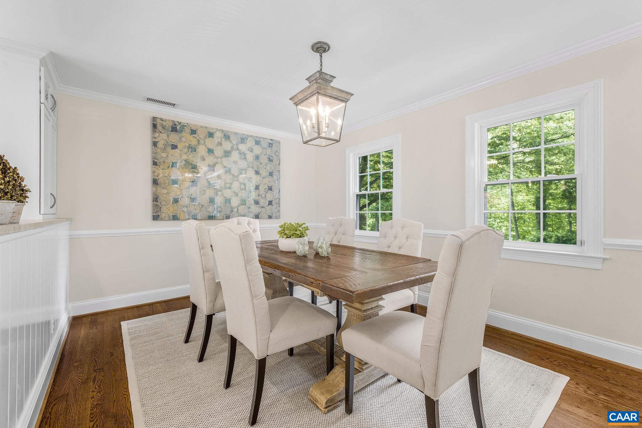 Lovely dining room is ideally situated just off the kitchen.