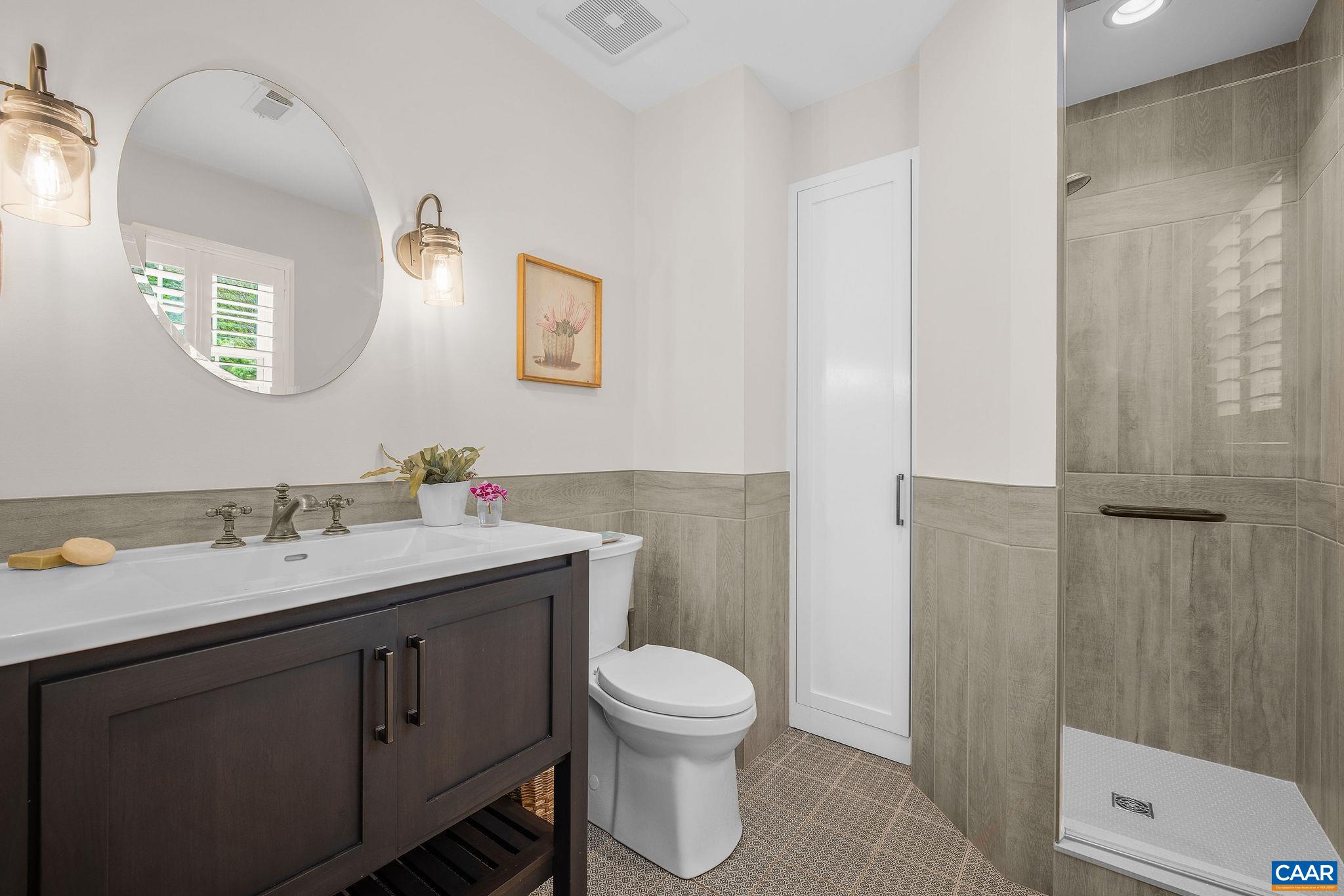Full bath conveniently located off the back patio is the perfect 