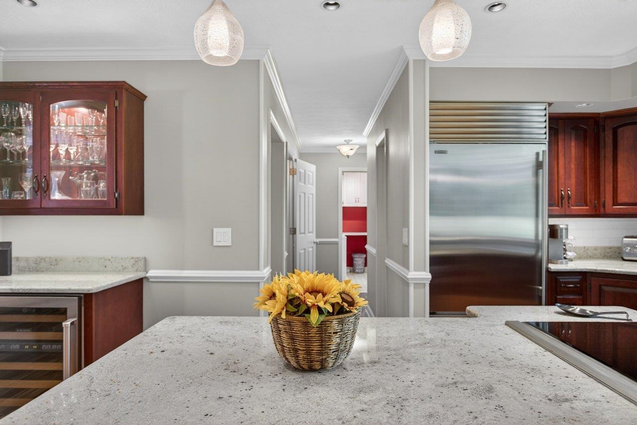 This hallway leads to the Half Bath, walk-in Pantry and Laundry Room This hallway leads to the Half Bath, walk-in Pantry and Laundry Room