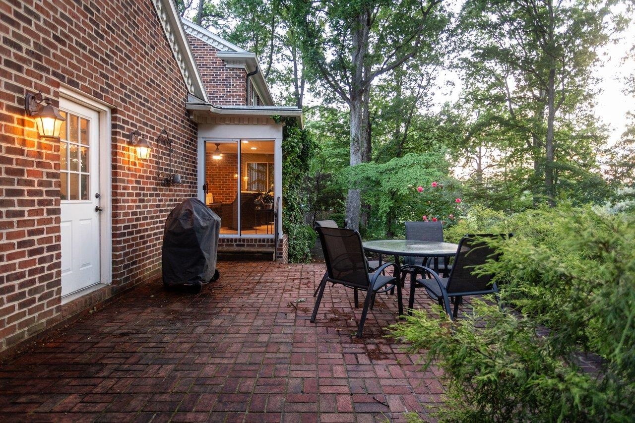 Step out of the Siunroom onto the large brick patio overlooking the peaceful backyard Step out of the Siunroom onto the large brick patio overlooking the peaceful backyard