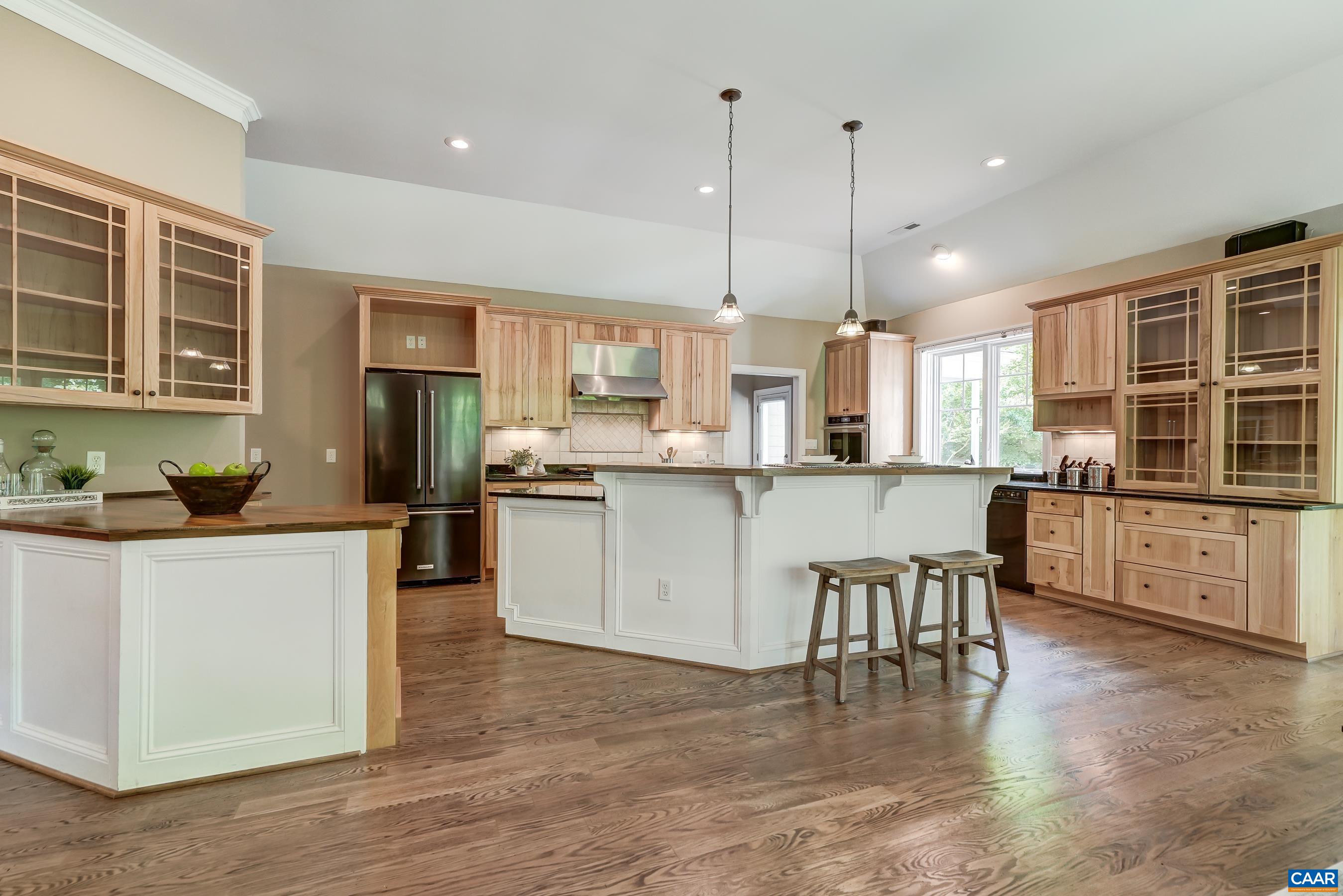 Gourmet ktichen features stainless appliances.