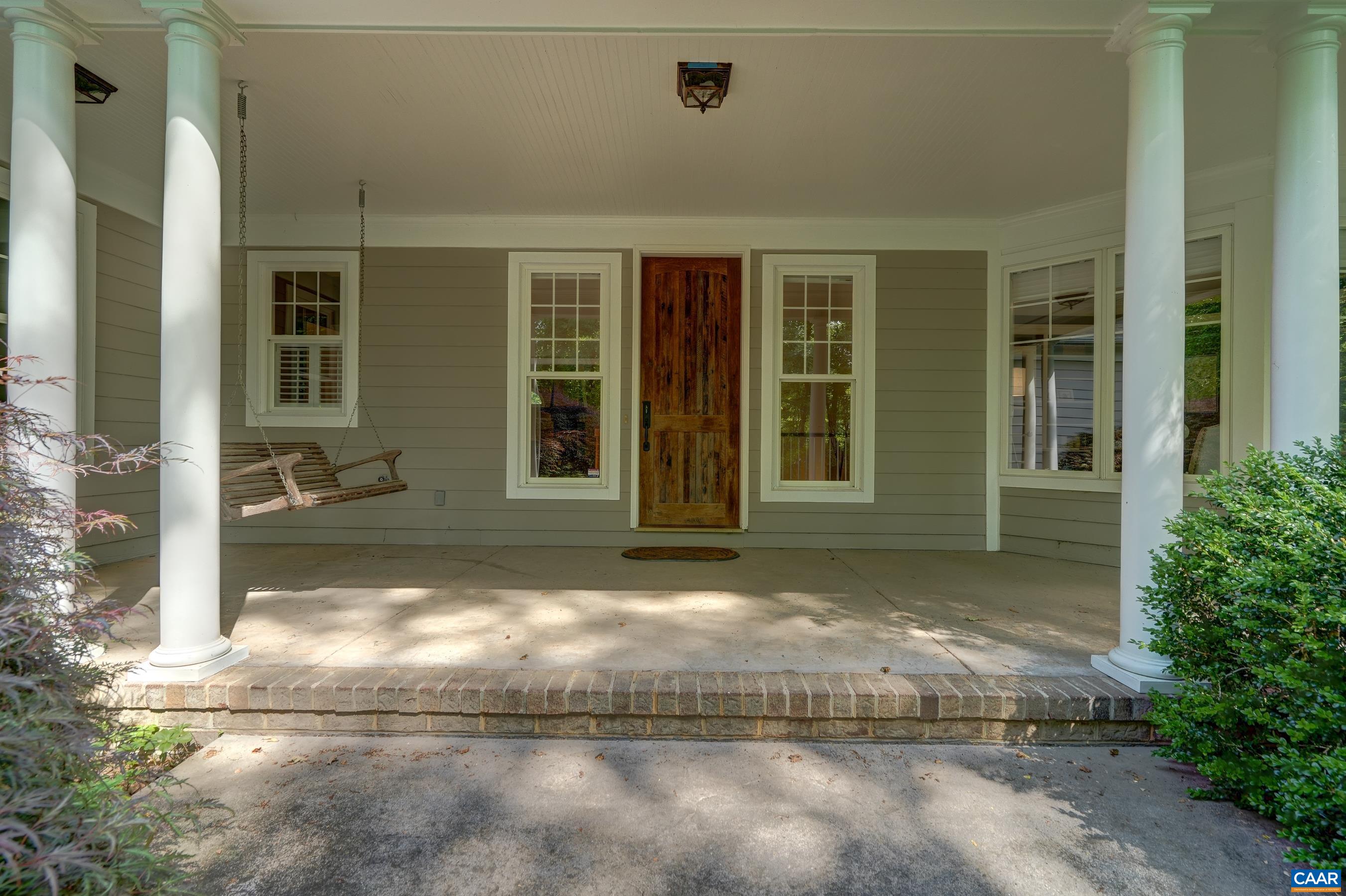 Covered front porch for nature lovers to enjoy.