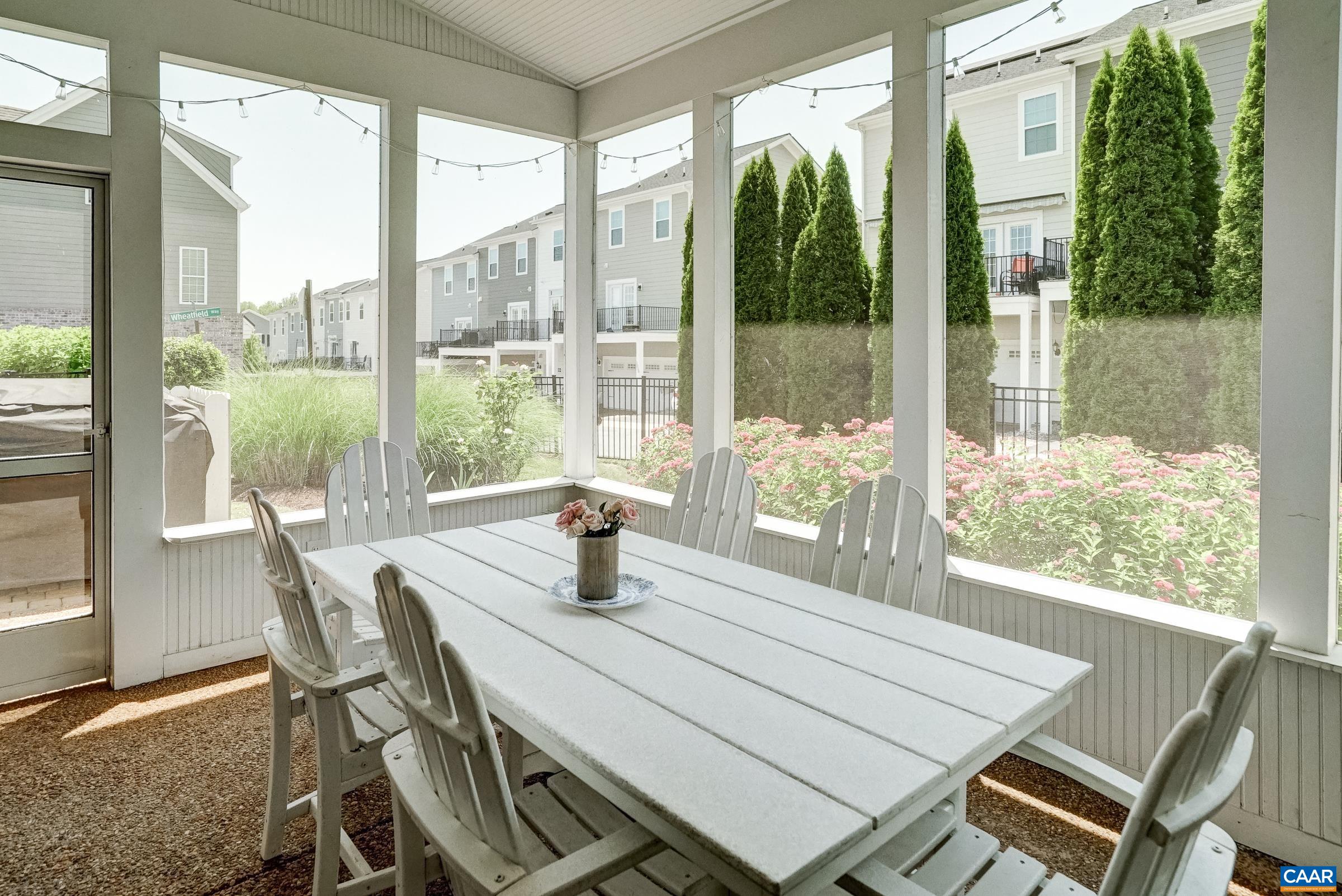 Screened porch is the perfect spot for outdoor dining and entertaining. Screened porch is the perfect spot for outdoor dining and entertaining.
