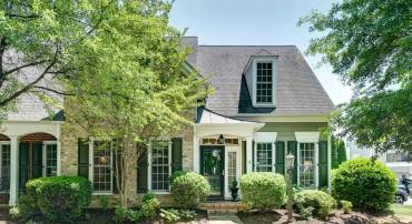 Rarely available end unit villa home with 5 bedrooms is walkable to Old Trail shops, restaurants and playground.