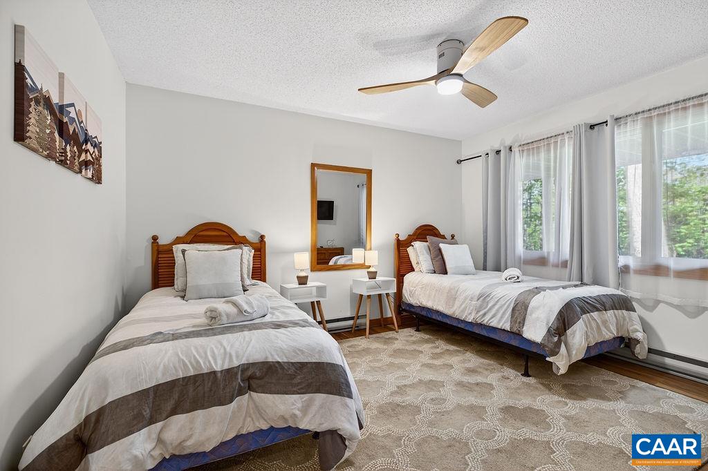 Second guest bedroom on the first level. Second guest bedroom on the first level.