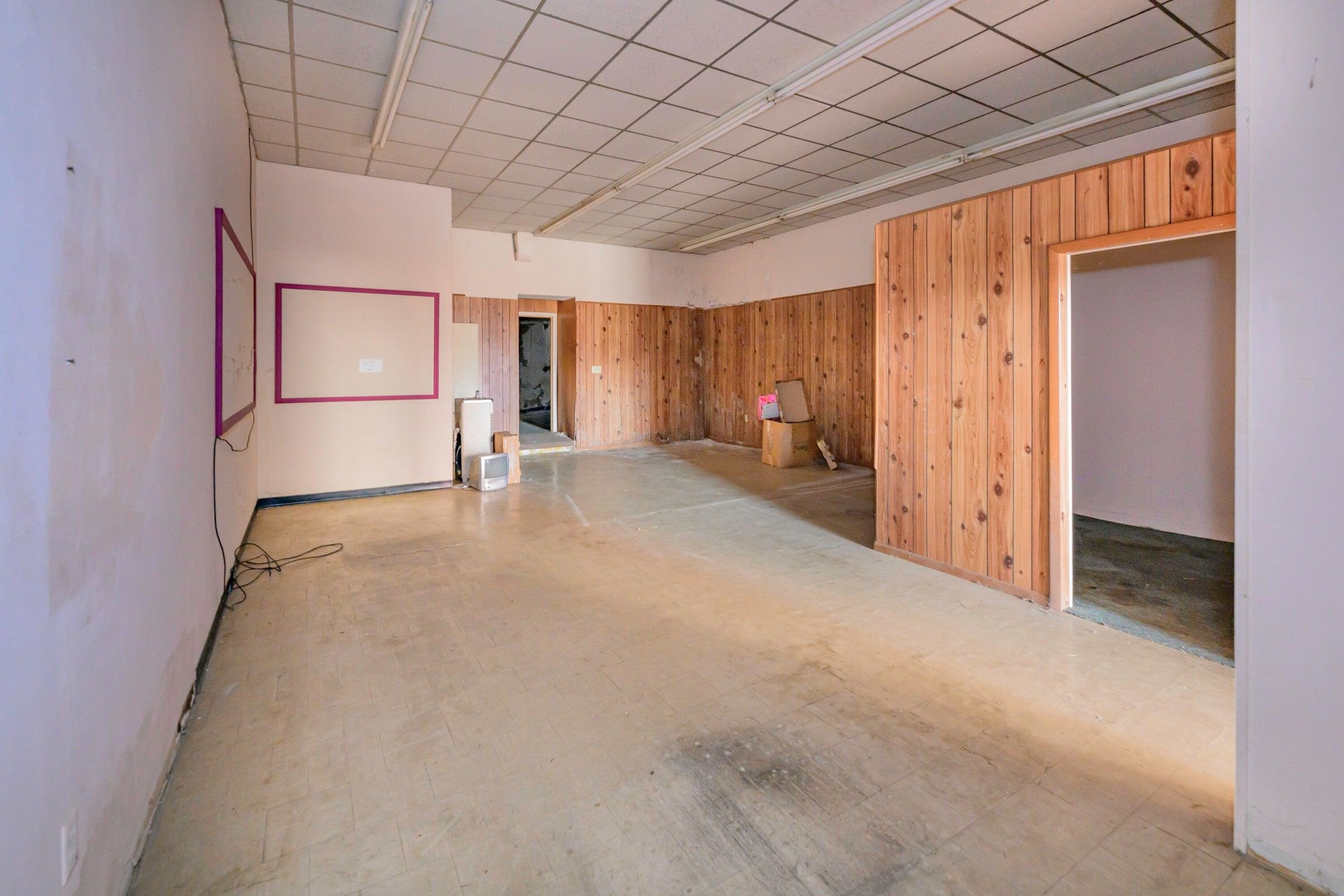 Storage and private areas behind the office space.
