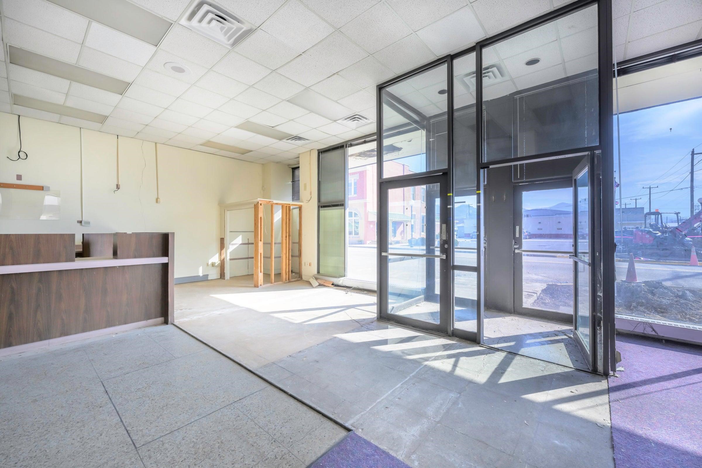Attractive glass doors open to the first level of 141 W 21st St.