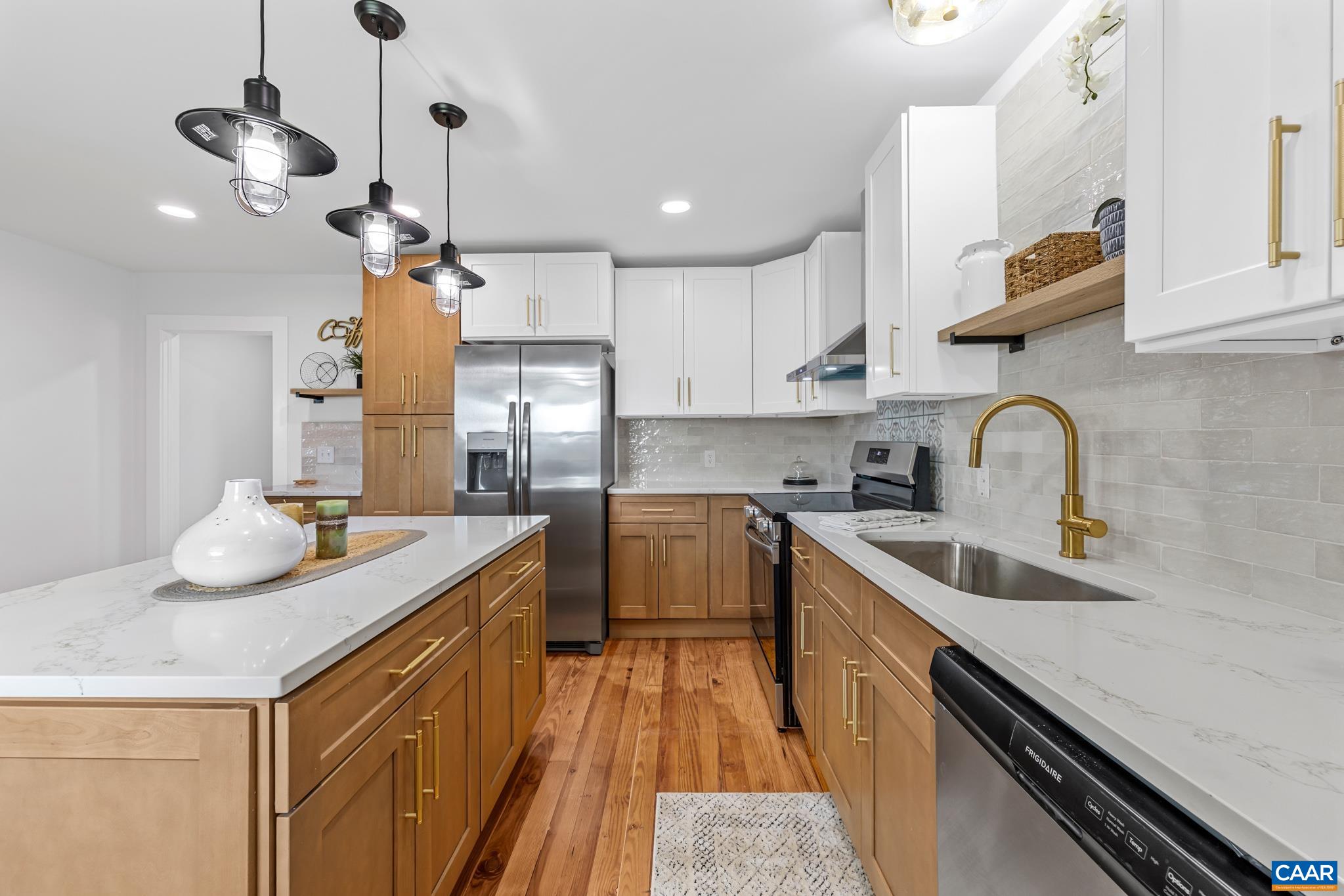 Brand new stainless steel appliances. custom tiled backsplash. This kitchen is perfect for both everyday living and entertaining Brand new stainless steel appliances. custom tiled backsplash. This kitchen is perfect for both everyday living and entertaining