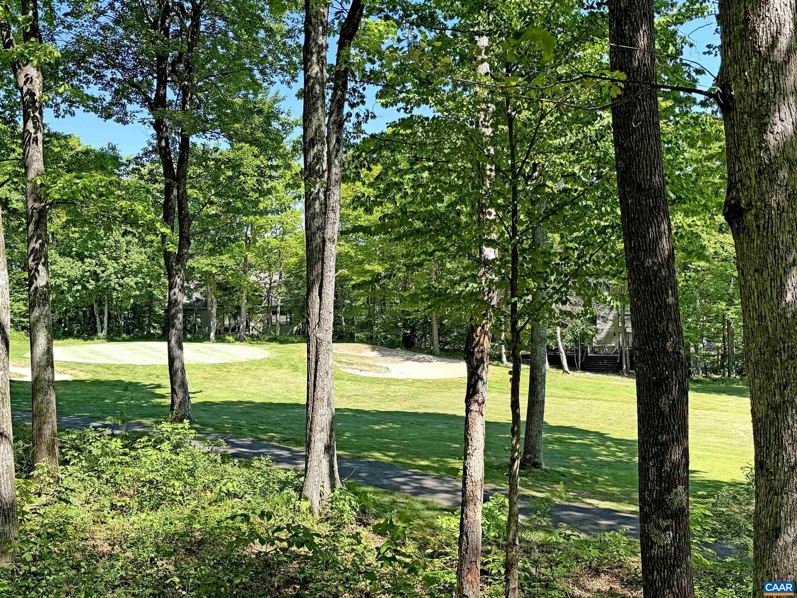 Expansive views of the golf fairway.