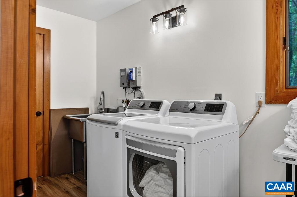 Laundry/ mudroom with a sink