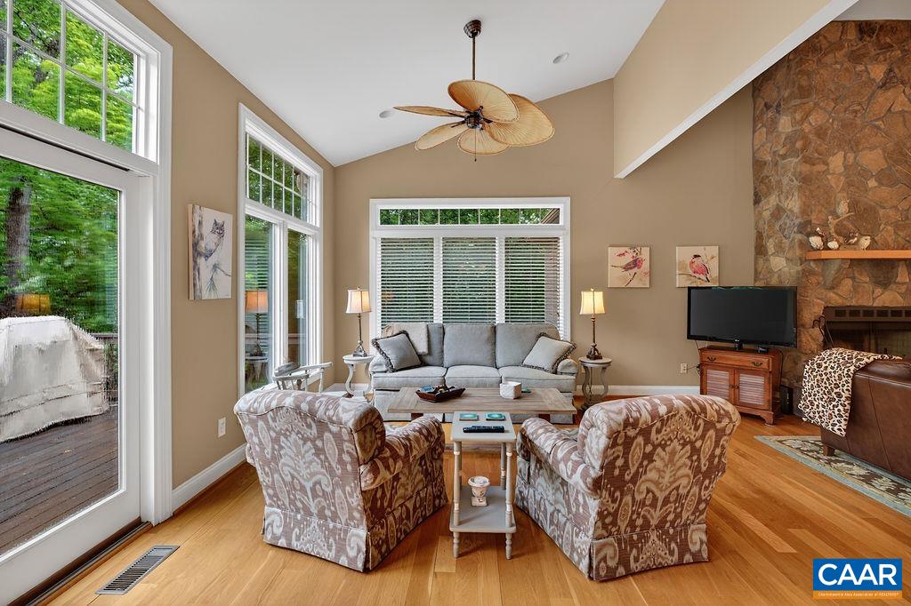 A charming conversation area near the windows and views enhances the versatility of the great room A charming conversation area near the windows and views enhances the versatility of the great room
