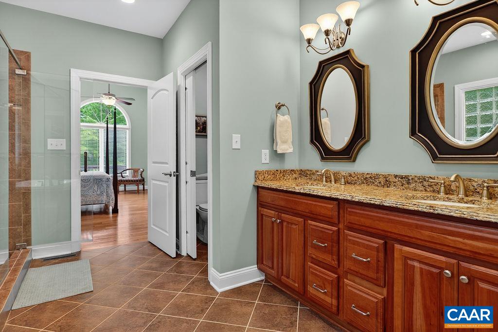 The primary suite also includes a large walk-in closet with built-in shelving. The primary suite also includes a large walk-in closet with built-in shelving.