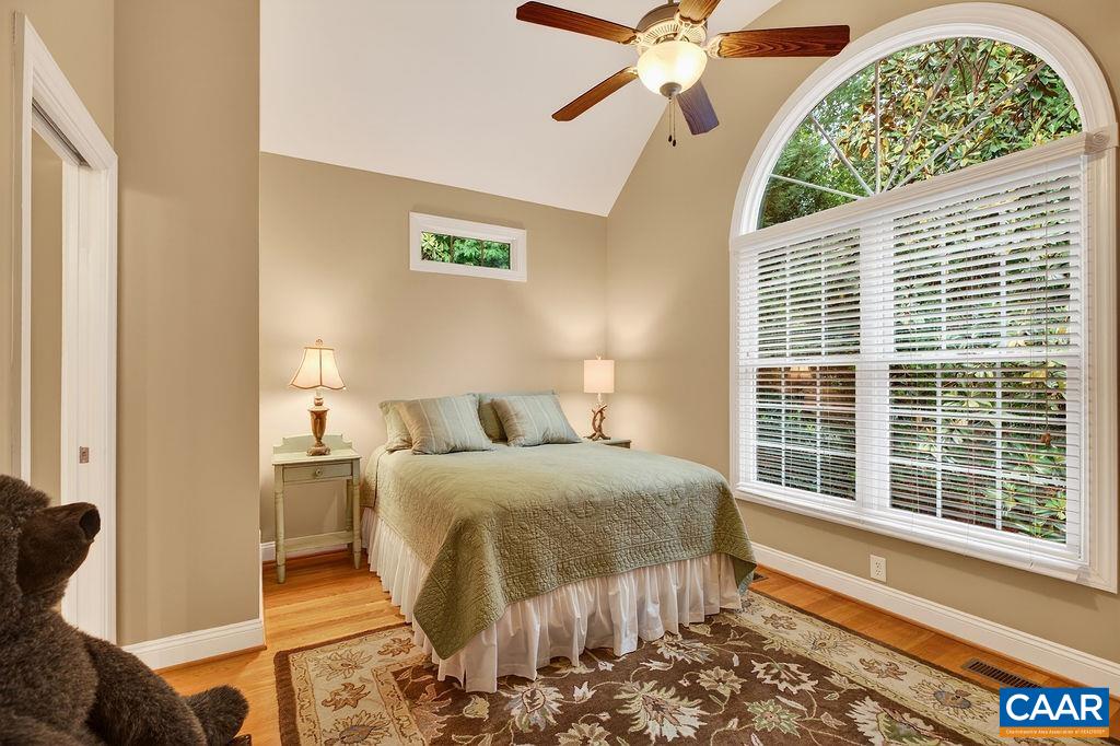 One of the two guest bedrooms on the main level. One of the two guest bedrooms on the main level.