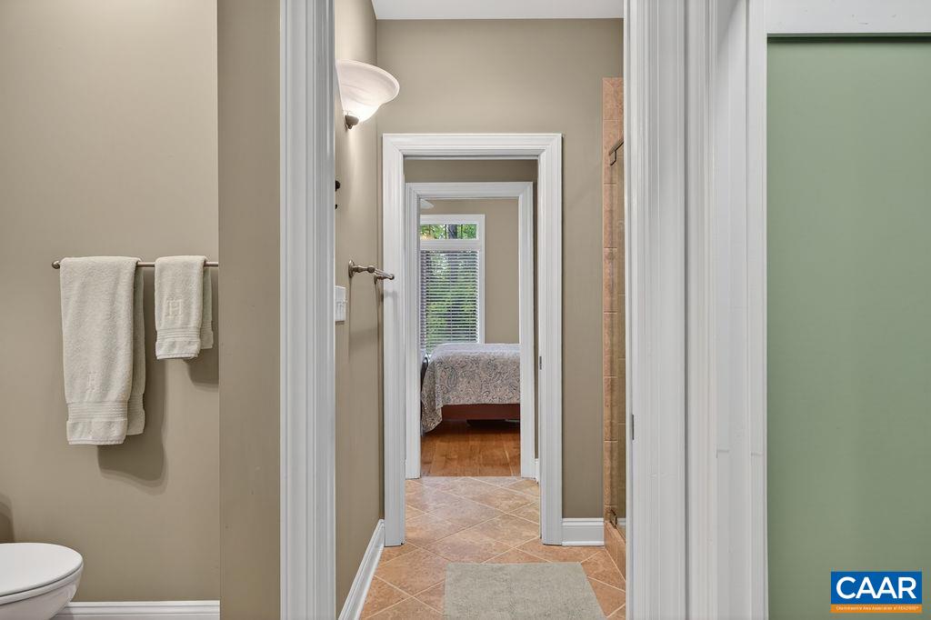Between the two guest bedrooms is a spacious shared bath area featuring a beautiful tiled shower. Each bedroom also enjoys its own private half bath and large closet, creating a comfortable and private setup your guests are sure to appreciate. Between the two guest bedrooms is a spacious shared bath area featuring a beautiful tiled shower. Each bedroom also enjoys its own private half bath and large closet, creating a comfortable and private setup your guests are sure to appreciate.