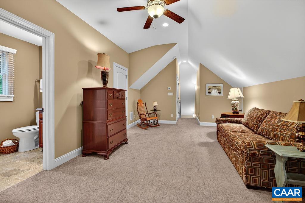 The upstairs guest suite offers a nice walk-in closet as well. The upstairs guest suite offers a nice walk-in closet as well.
