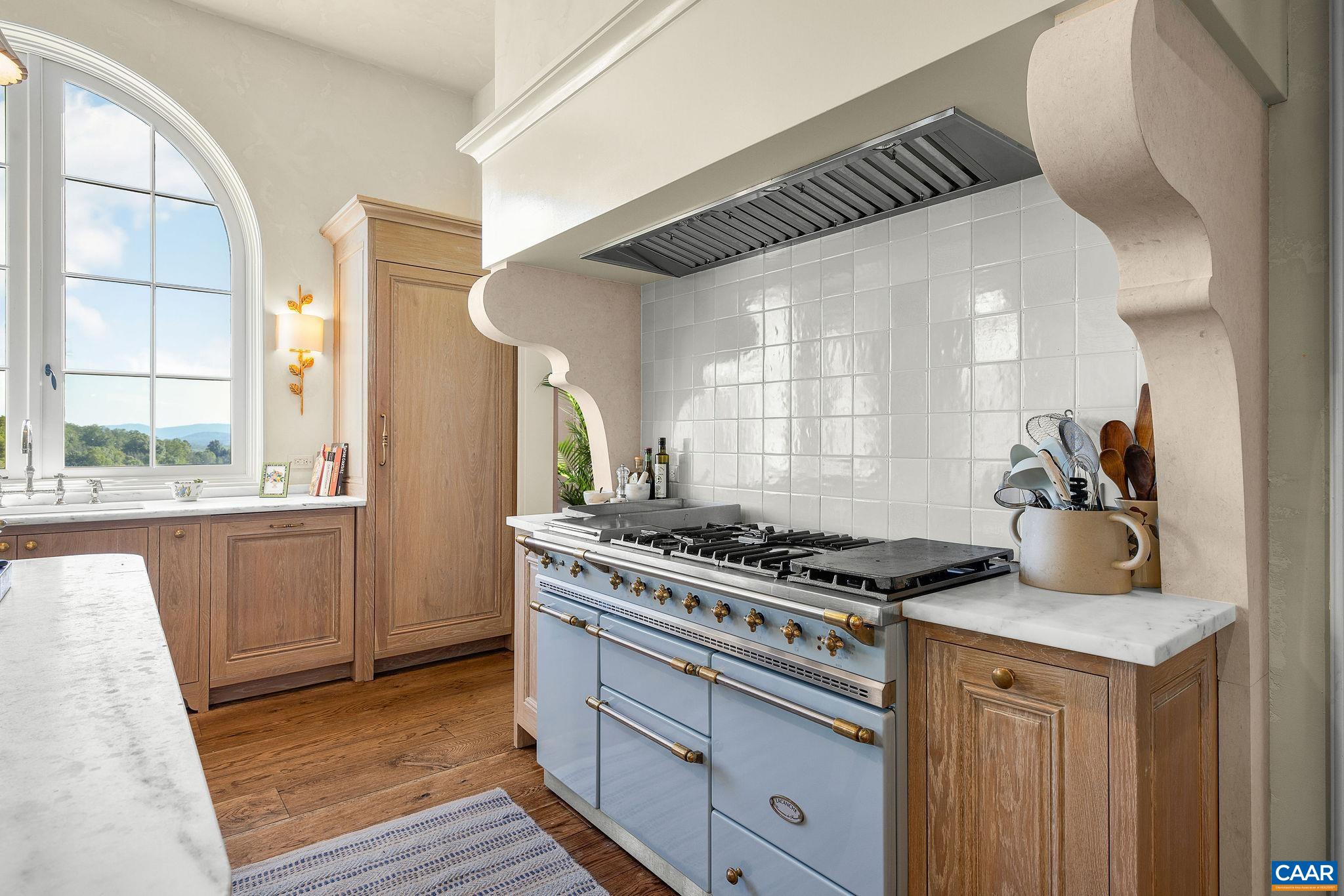 LaCanche range and 2 Miele dishwashers