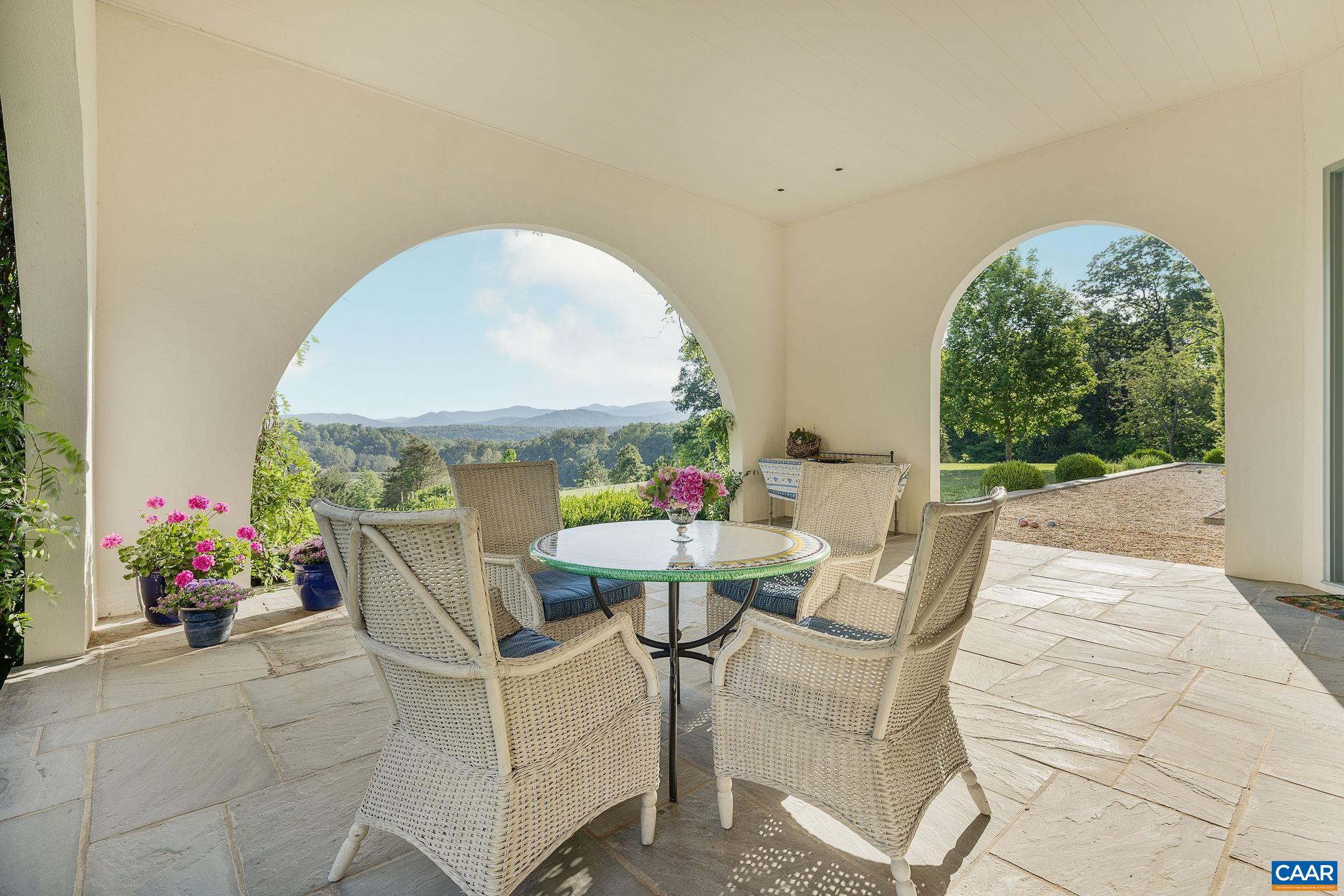 This Summer Porch is located just off the family room.