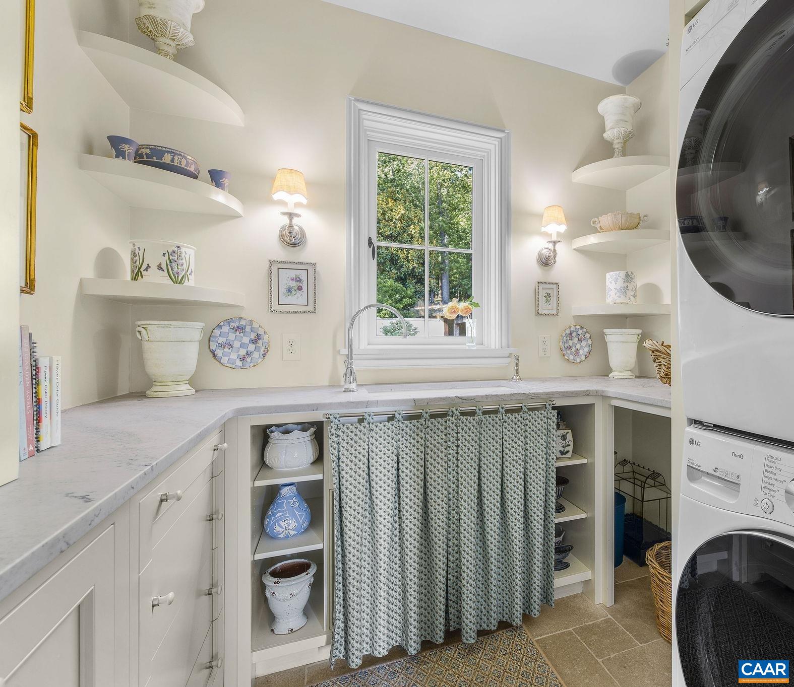 1st fl laundry and flower room.  There is also a 2nd fl laundry room.