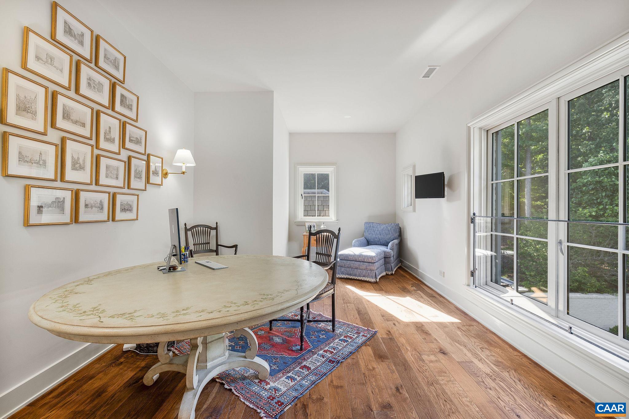 The 4th ensuite bedroom upstairs is currently utilized as an office