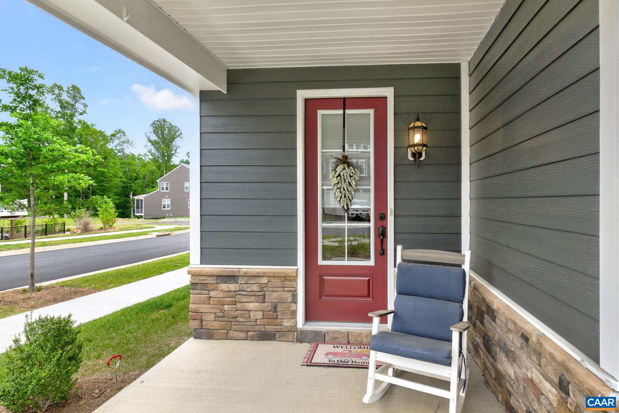 Welcoming front porch with room to rock. Welcoming front porch with room to rock.