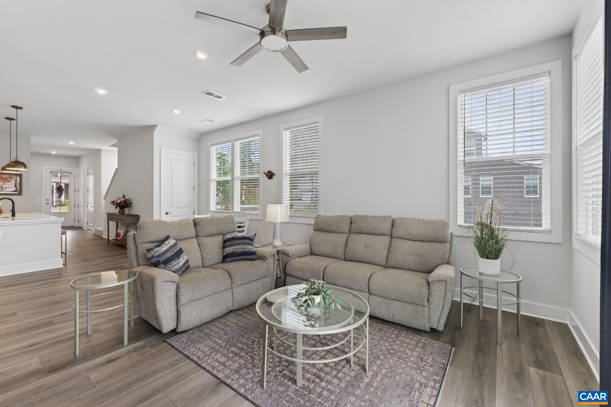 End unit home features lots of natural light in the living room. End unit home features lots of natural light in the living room.