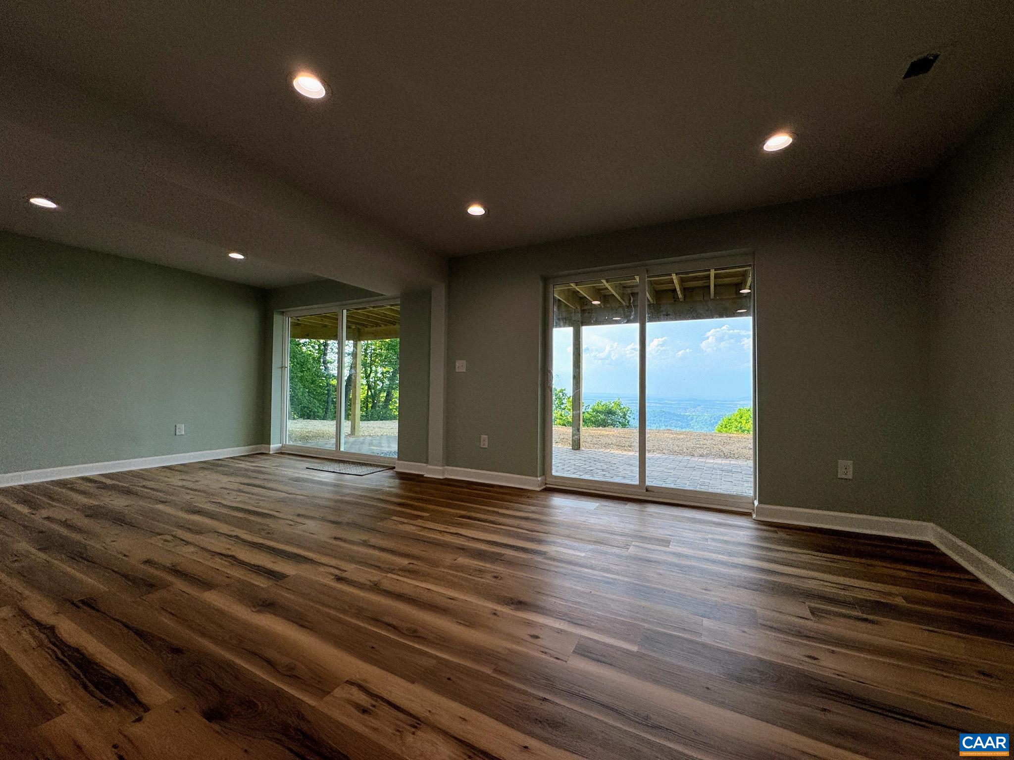 ... with more Views of Valley Below. Walk out to Large Brick Patio. ... with more Views of Valley Below. Walk out to Large Brick Patio.