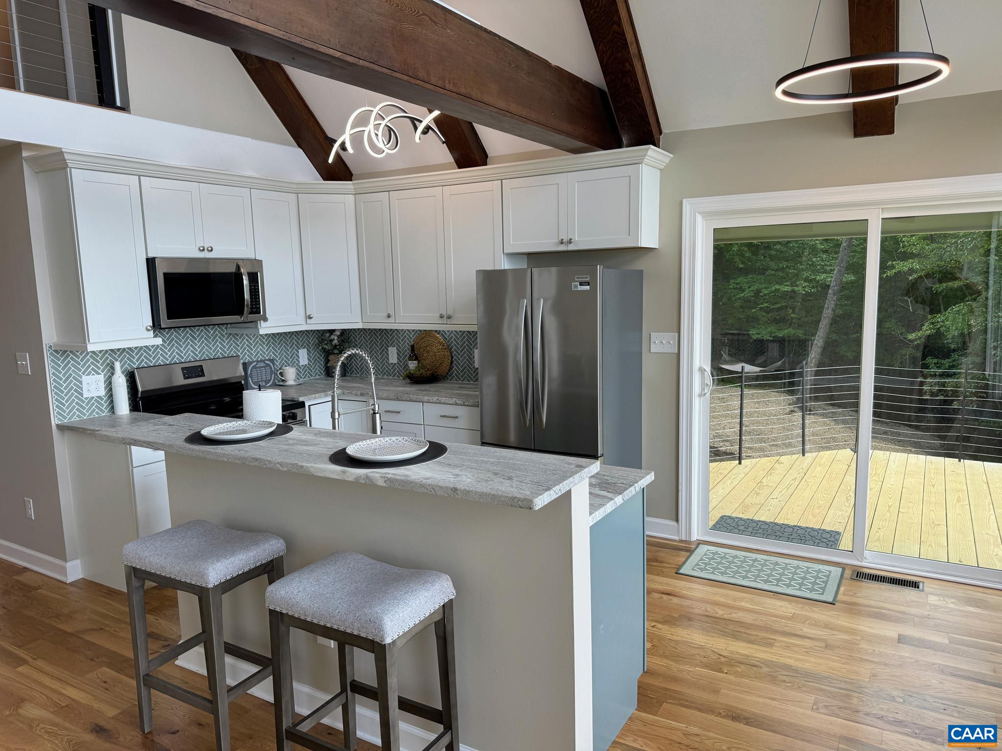 ... with Granite Counters, Island Breakfast Bar, access to Large Deck. ... with Granite Counters, Island Breakfast Bar, access to Large Deck.