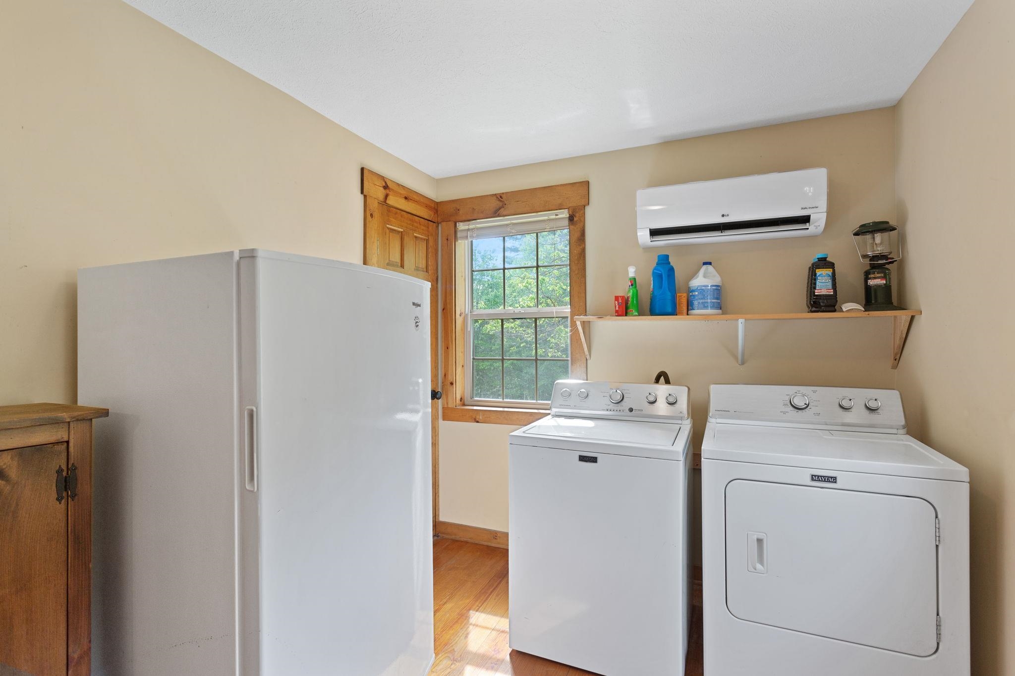 with 2 closets and space for freezer.