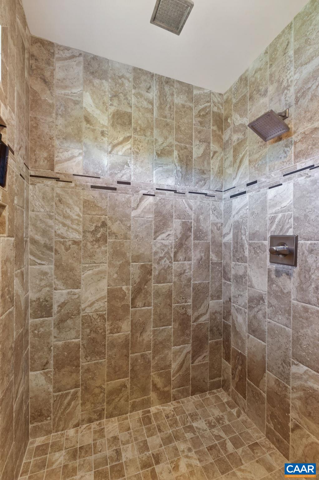 wraps around and features 2 shower heads. wraps around and features 2 shower heads.