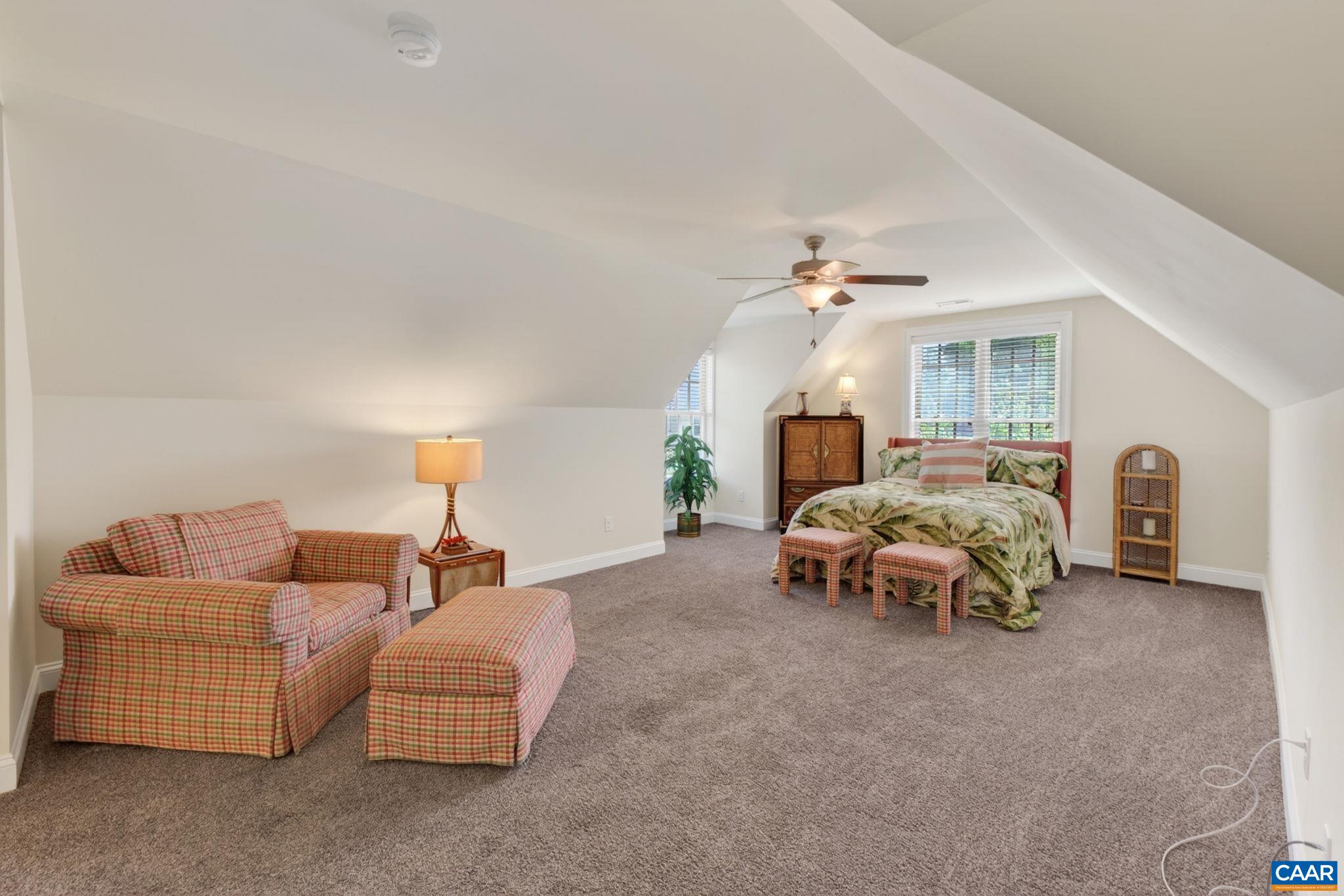 This second level offers this large bonus room/bedroom, but also has a full bathroom and a kitchenette! This second level offers this large bonus room/bedroom, but also has a full bathroom and a kitchenette!