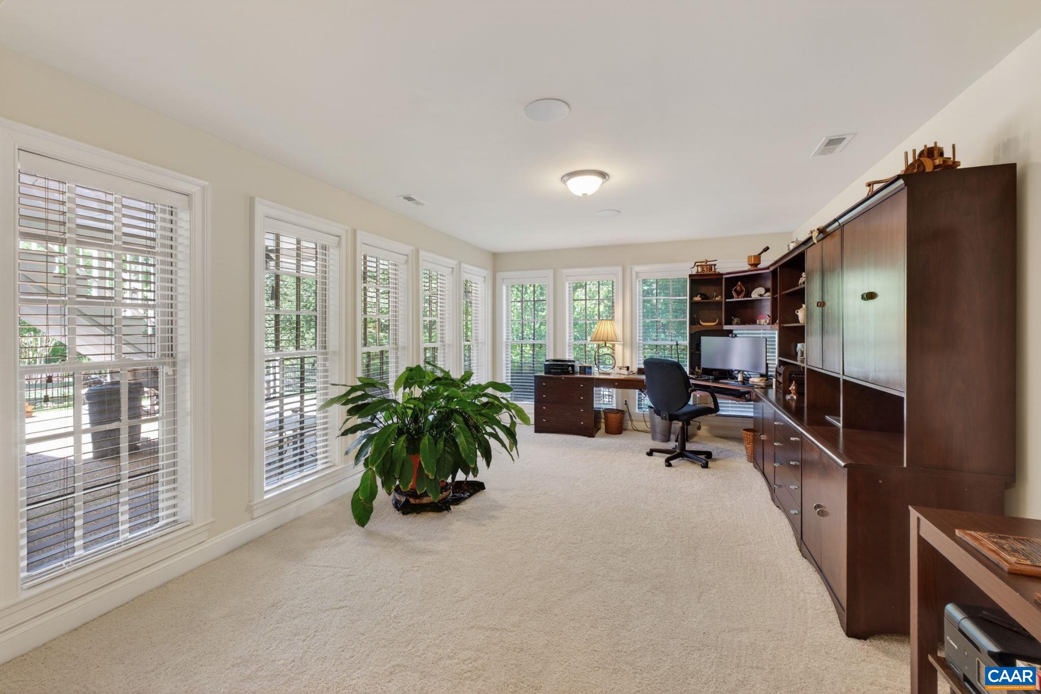Located under the sunroom, and currently being used as an office. Located under the sunroom, and currently being used as an office.