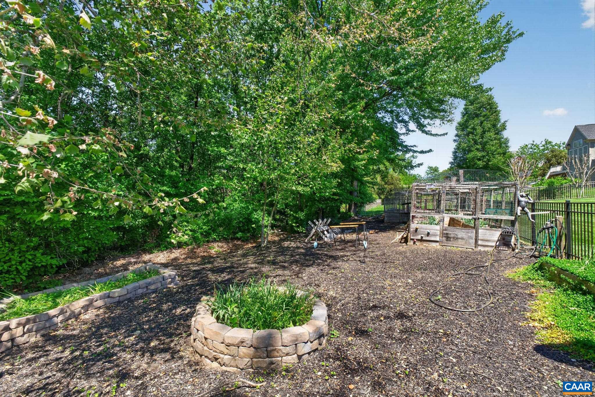 Mulched area leading to raised beds. Mulched area leading to raised beds.