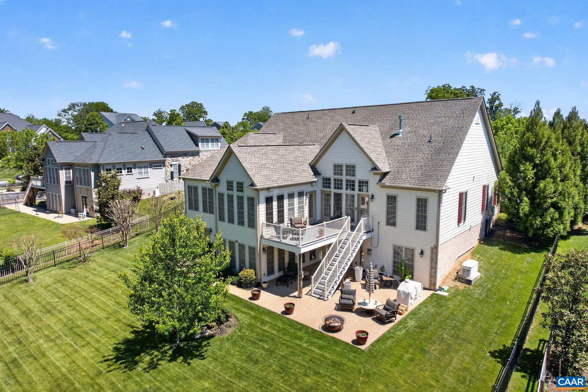 with access to the main level deck and leading down to the enlarged, partially covered terrace! with access to the main level deck and leading down to the enlarged, partially covered terrace!