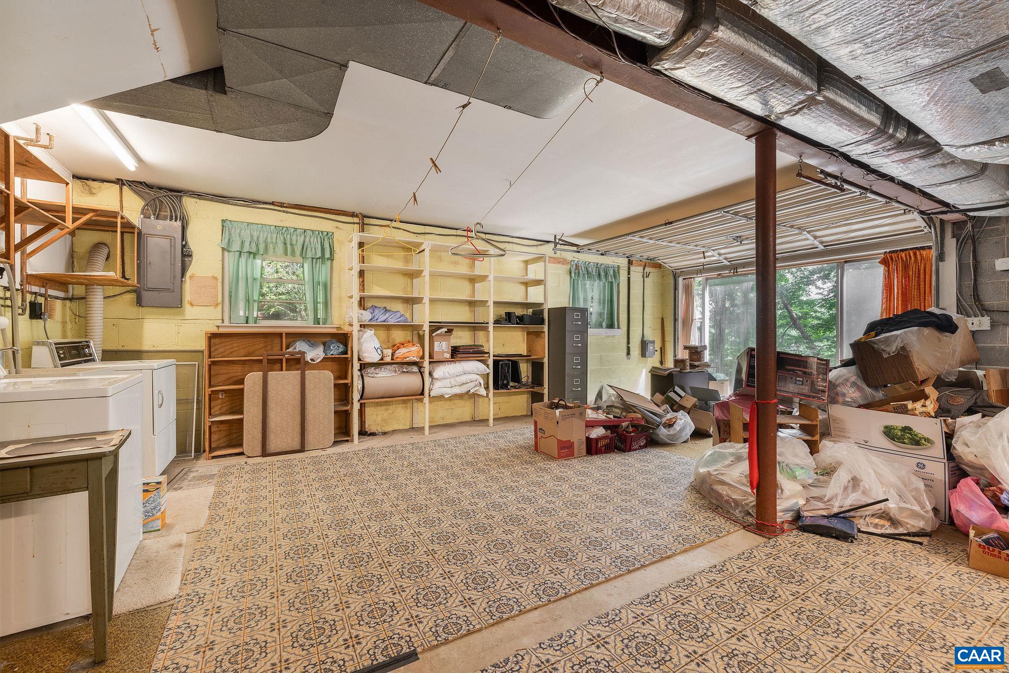 Garage is currently configured as additional interior space but can be easily converted back, with garage door still in place. Garage is currently configured as additional interior space but can be easily converted back, with garage door still in place.